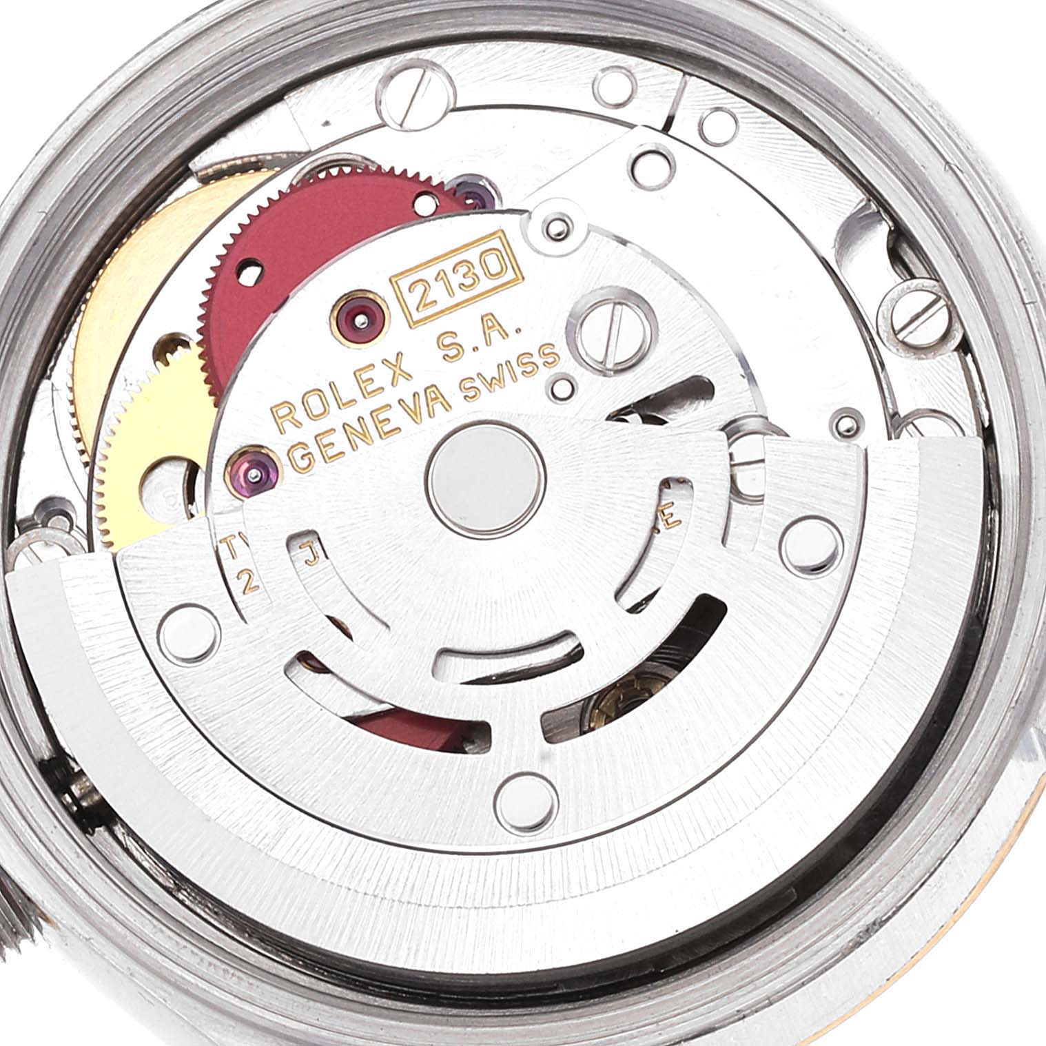 The image shows a close-up view of the movement mechanism of a Rolex Oyster Perpetual 67193 Women's Steel and Gold (two tone) Champagne Dial 67193 Women's Steel and Gold (two tone) Champagne Dial model watch, focusing on the rotor and gears.
