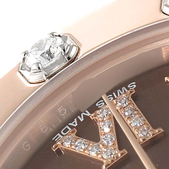 Close-up of the Rolex Pearlmaster 81315 Women
s Rose Gold Brown Dial 81315 Women
s Rose Gold Brown Dial watch showing the bejeweled bezel and part of the dial with diamond-set Roman numerals.