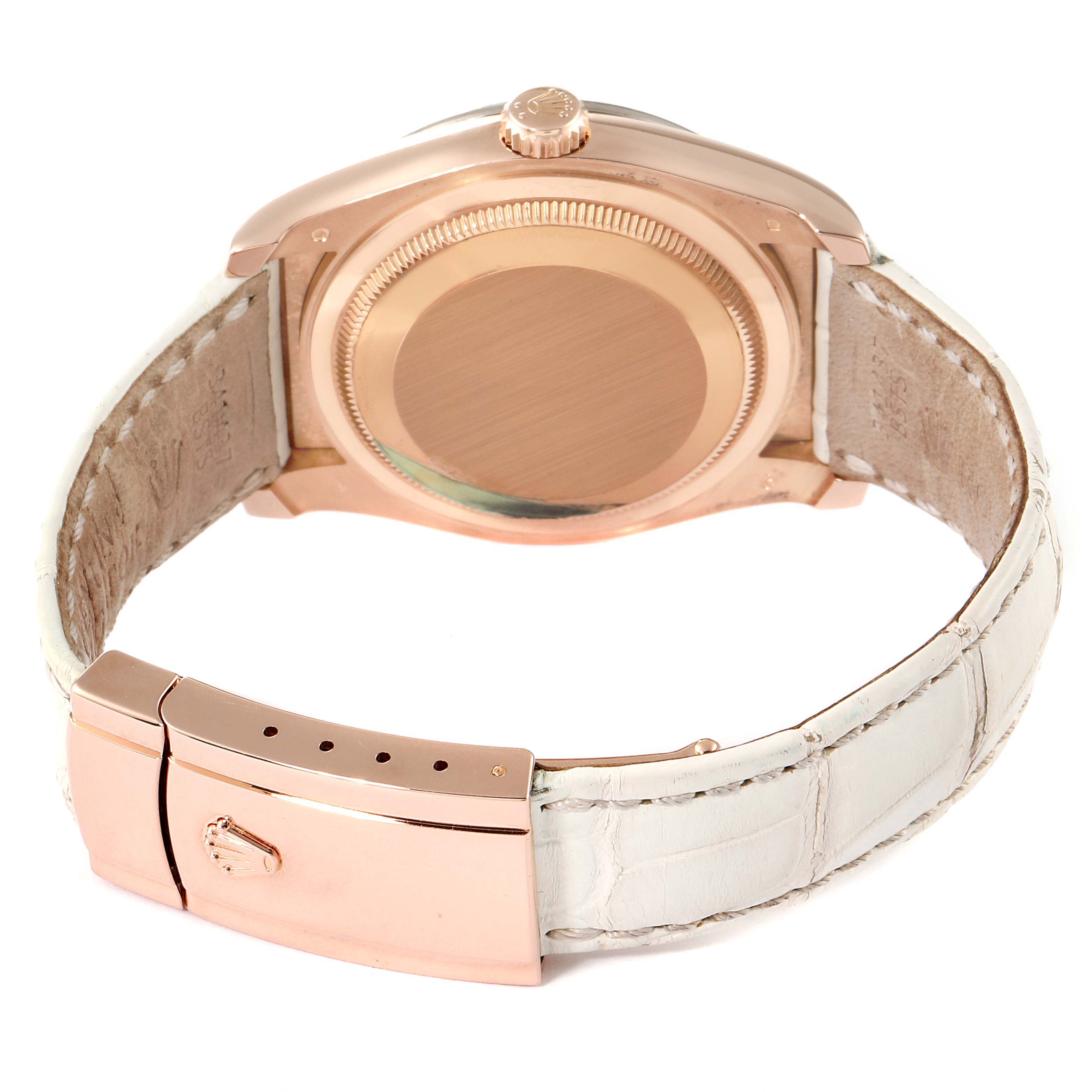 This image shows the back and clasp of a Rolex Datejust 116185 Men's Rose Gold Mother of Pearl Dial 116185 Men's Rose Gold Mother of Pearl Dial watch with a rose gold case and white leather strap.