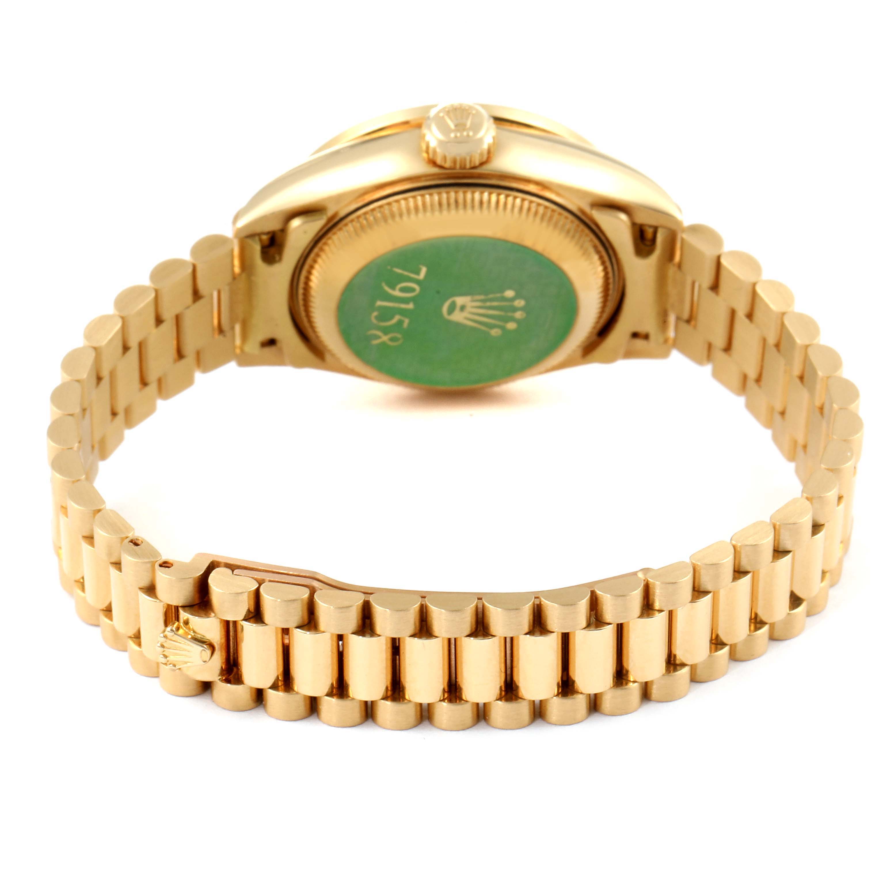 This image shows the backside and bracelet of a Rolex President 79158 Women
s Yellow Gold Champagne Dial 79158 Women
s Yellow Gold Champagne Dial model watch, focusing on the clasp and case back.