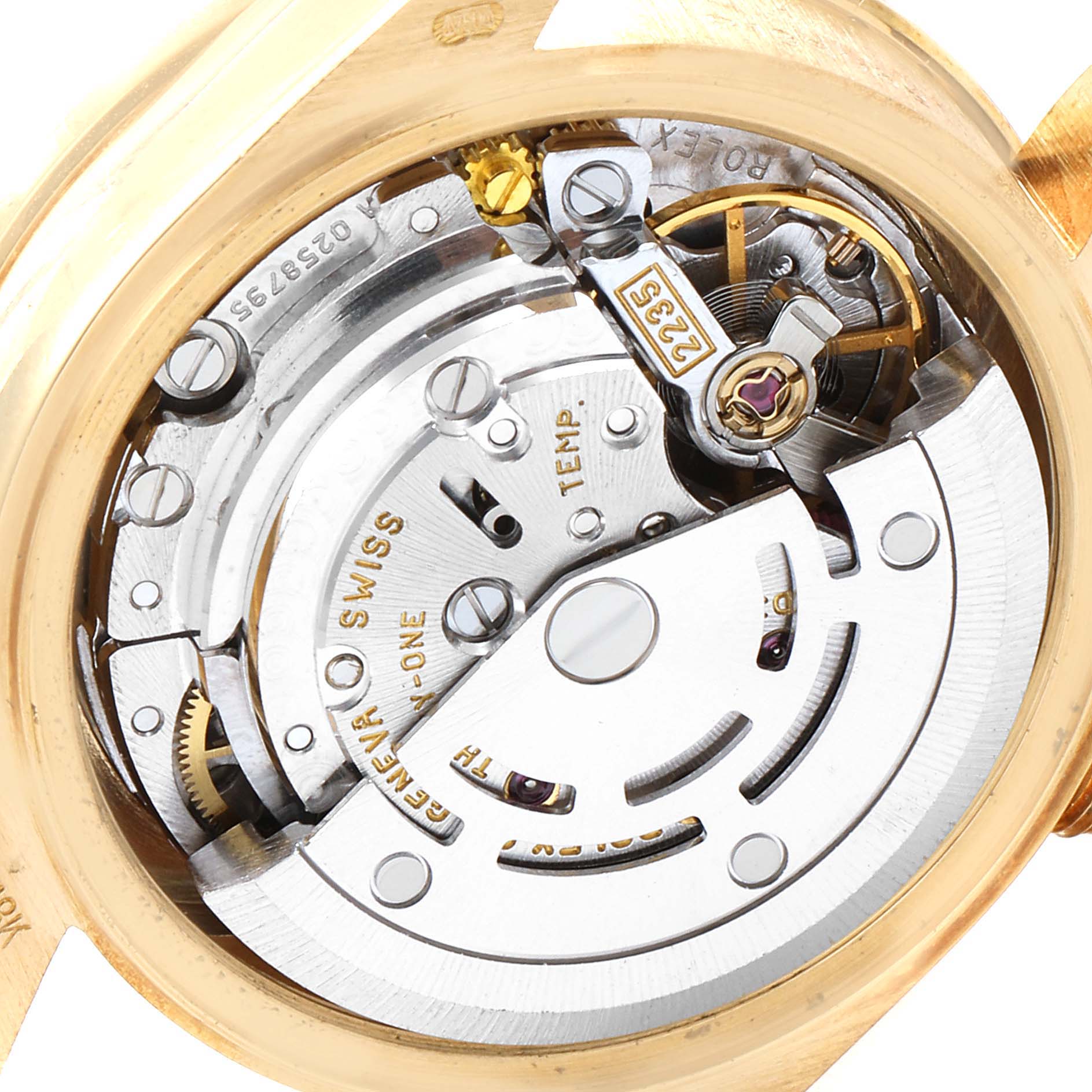 This image shows the intricate internal mechanics of a Rolex President 79158 Women
s Yellow Gold Champagne Dial 79158 Women
s Yellow Gold Champagne Dial model watch from a back angle with the case removed.