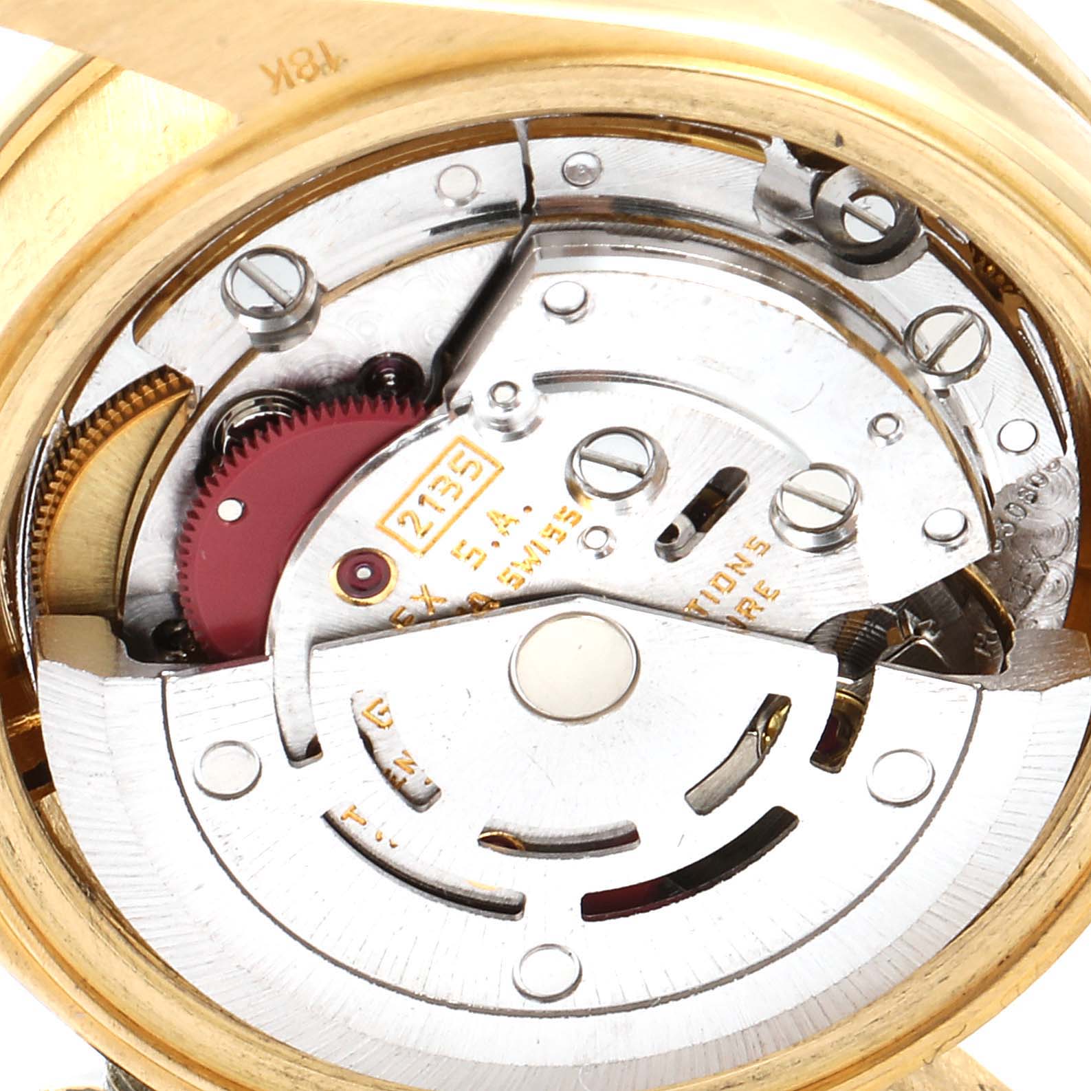 The image shows a close-up of the movement mechanism of a Rolex President 69038 Women's Yellow Gold Champagne Dial 69038 Women's Yellow Gold Champagne Dial model watch.