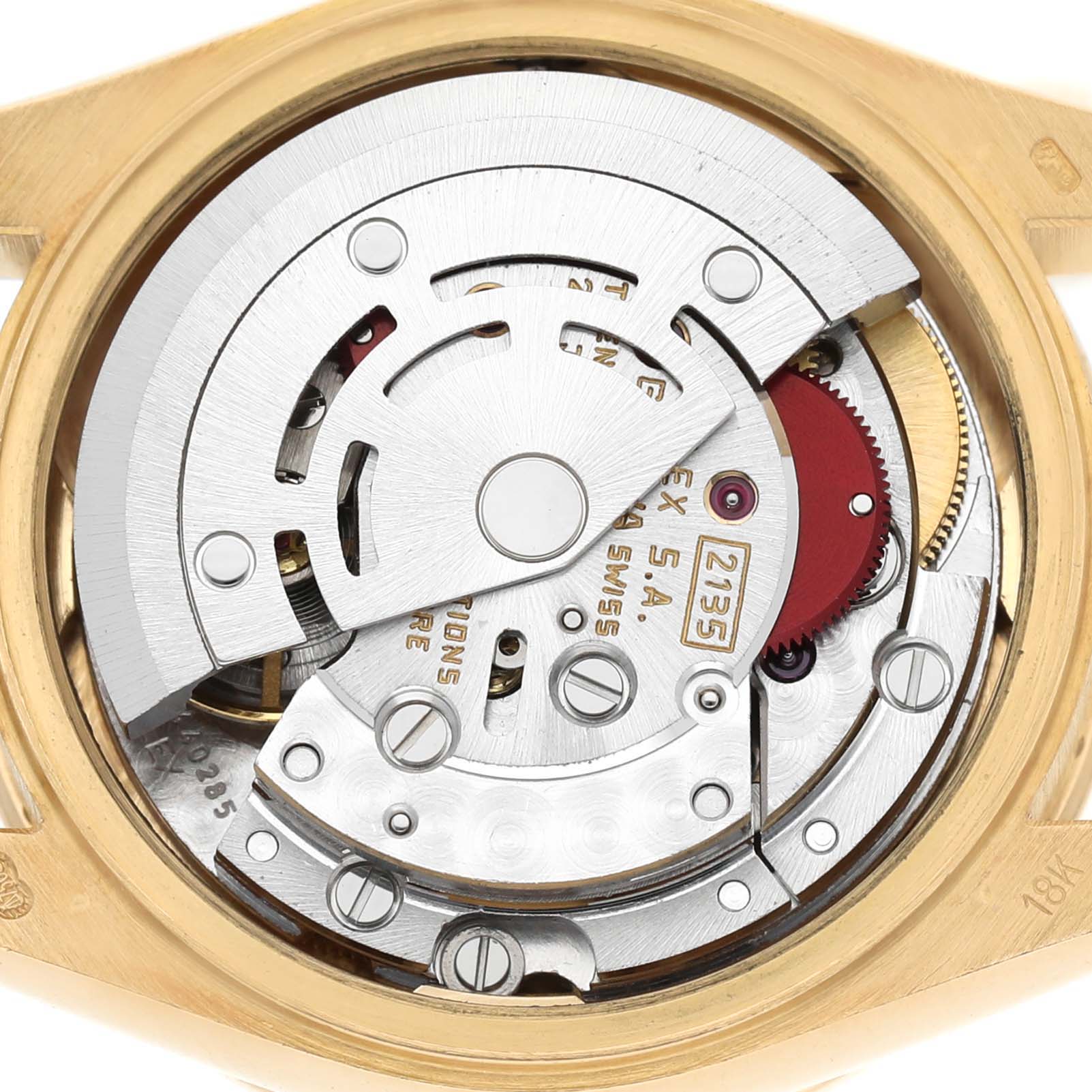 The image shows the internal mechanism of a Rolex President 69138 Women's Yellow Gold Champagne Dial watch from a back view angle.