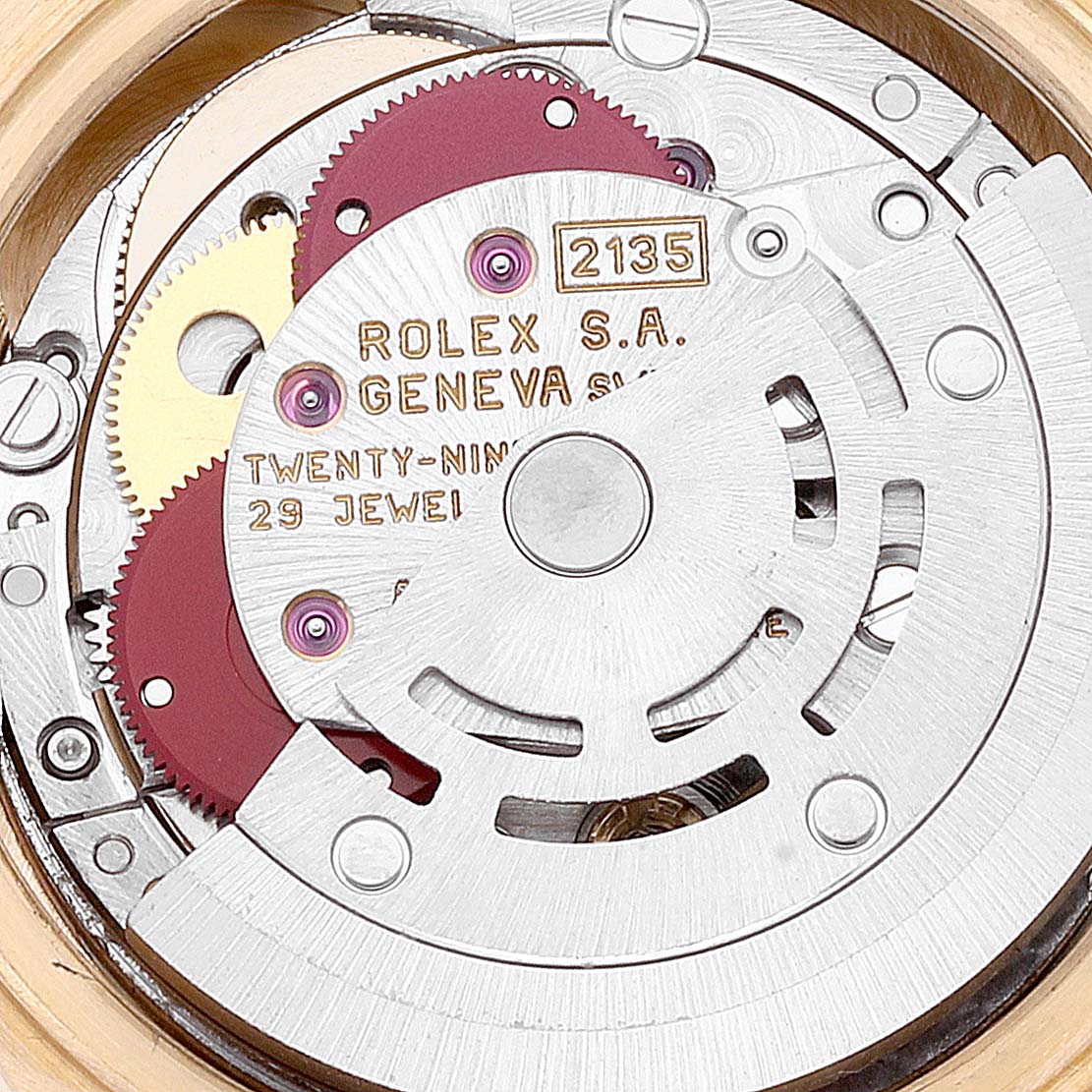This close-up image shows the intricate internal mechanism of the Rolex President 69028 Women's Yellow Gold Mother of Pearl Dial 69028 Women's Yellow Gold Mother of Pearl Dial model, highlighting the movement components.