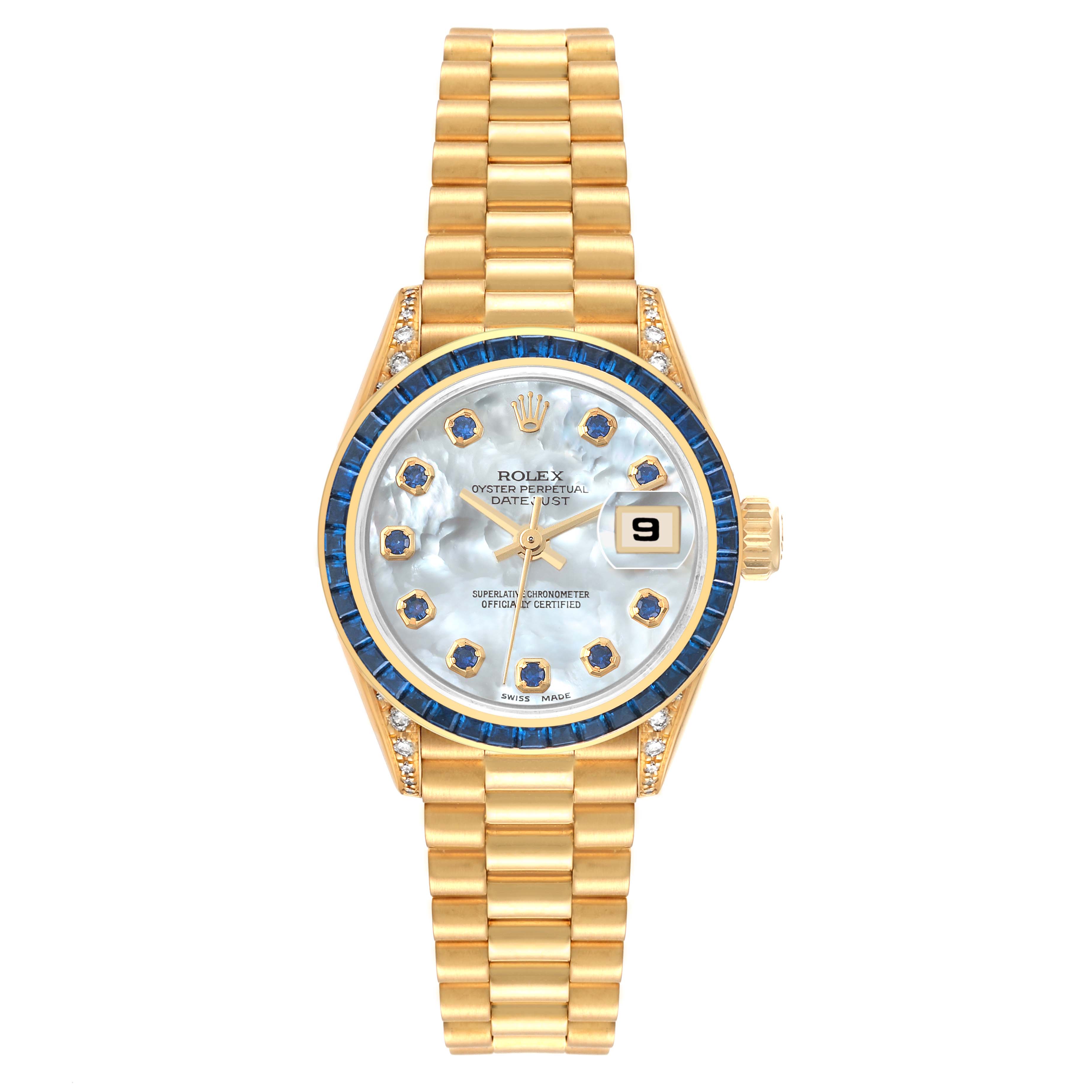 The image shows a front view of a Rolex President 69028 Women's Yellow Gold Mother of Pearl Dial 69028 Women's Yellow Gold Mother of Pearl Dial model watch with a gold band and a blue gemstone-studded dial.