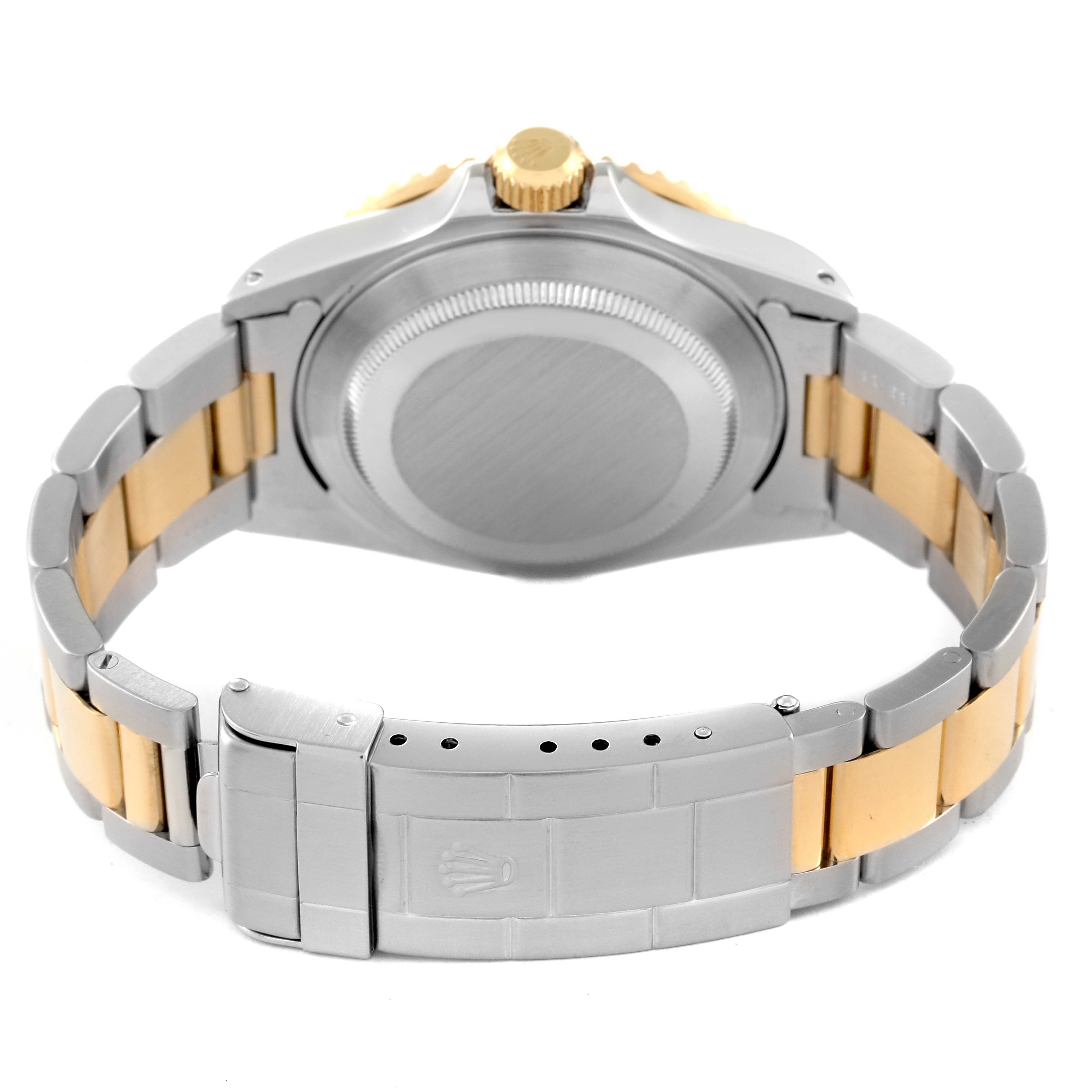 The image shows the back view of a Rolex Submariner 16613 Men's Steel and Gold (two tone) Blue Dial 16613 Men's Steel and Gold (two tone) Blue Dial watch, highlighting its bracelet and clasp.