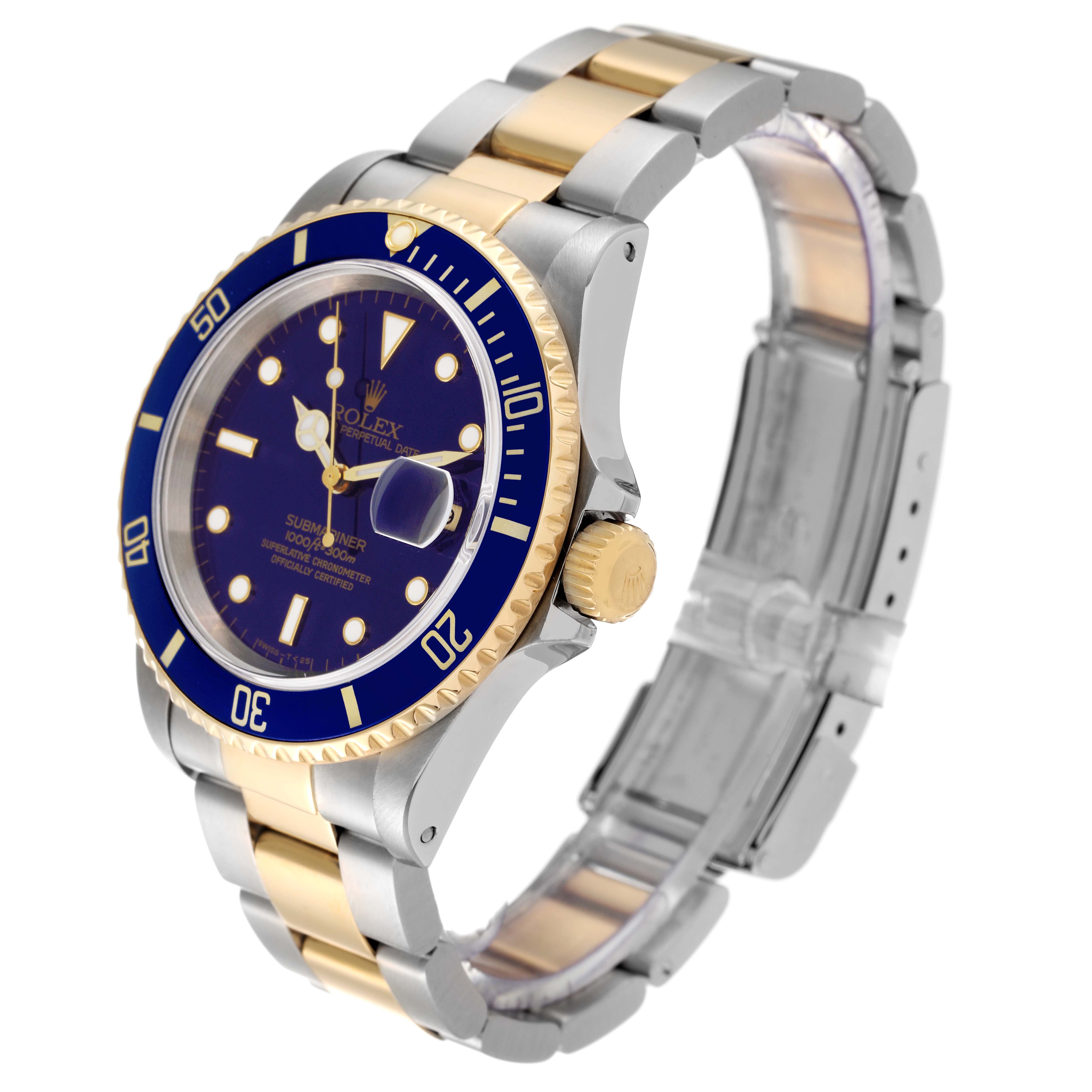 This Rolex Submariner 16613 Men's Steel and Gold (two tone) Blue Dial 16613 Men's Steel and Gold (two tone) Blue Dial model is shown at a three-quarter angle, highlighting its blue face, bezel, and two-tone bracelet.