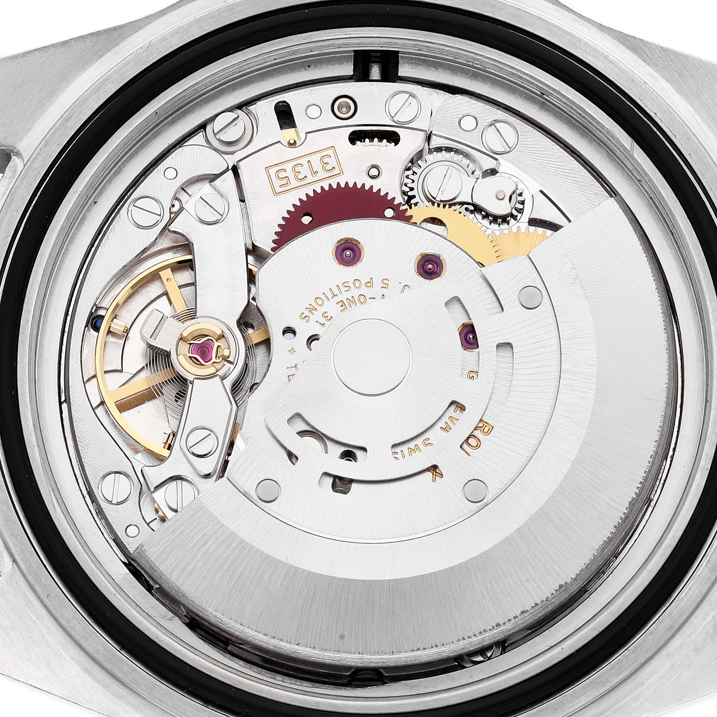 This image shows the intricate internal mechanics of a Rolex Submariner 16610 Men
s Stainless Steel Black Dial 16610 Men
s Stainless Steel Black Dial watch from a top-down angle.
