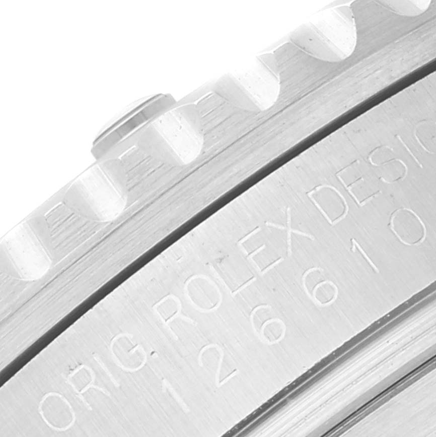 The image shows a close-up of the side engraving and bezel edge of the Rolex Submariner 126610LV Men
s Stainless Steel Black Dial 126610LV Men
s Stainless Steel Black Dial watch.