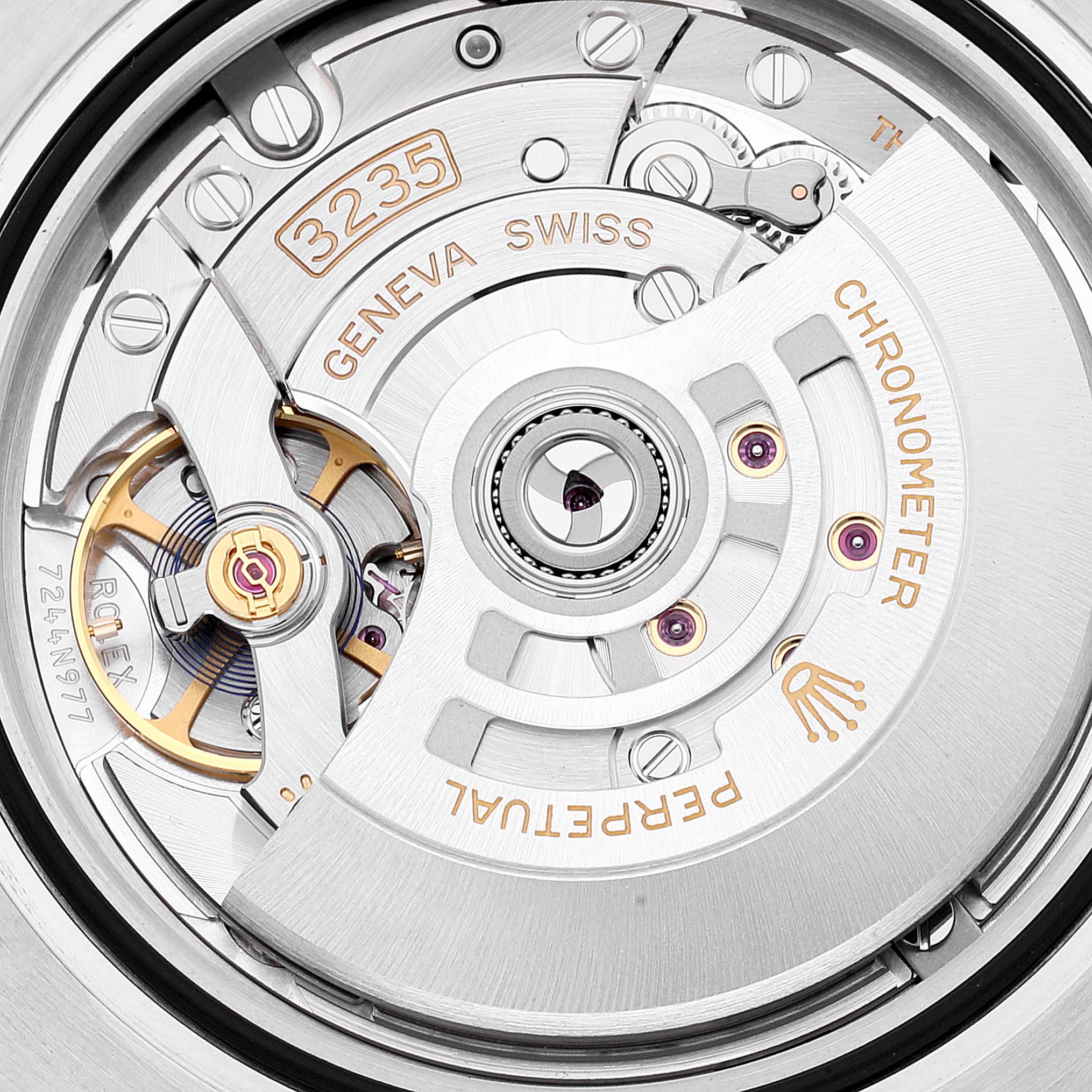 The image shows the intricate internal mechanism and rotor of a Rolex Submariner 126610LV Men
s Stainless Steel Black Dial 126610LV Men
s Stainless Steel Black Dial 3235 movement from a top-down angle.