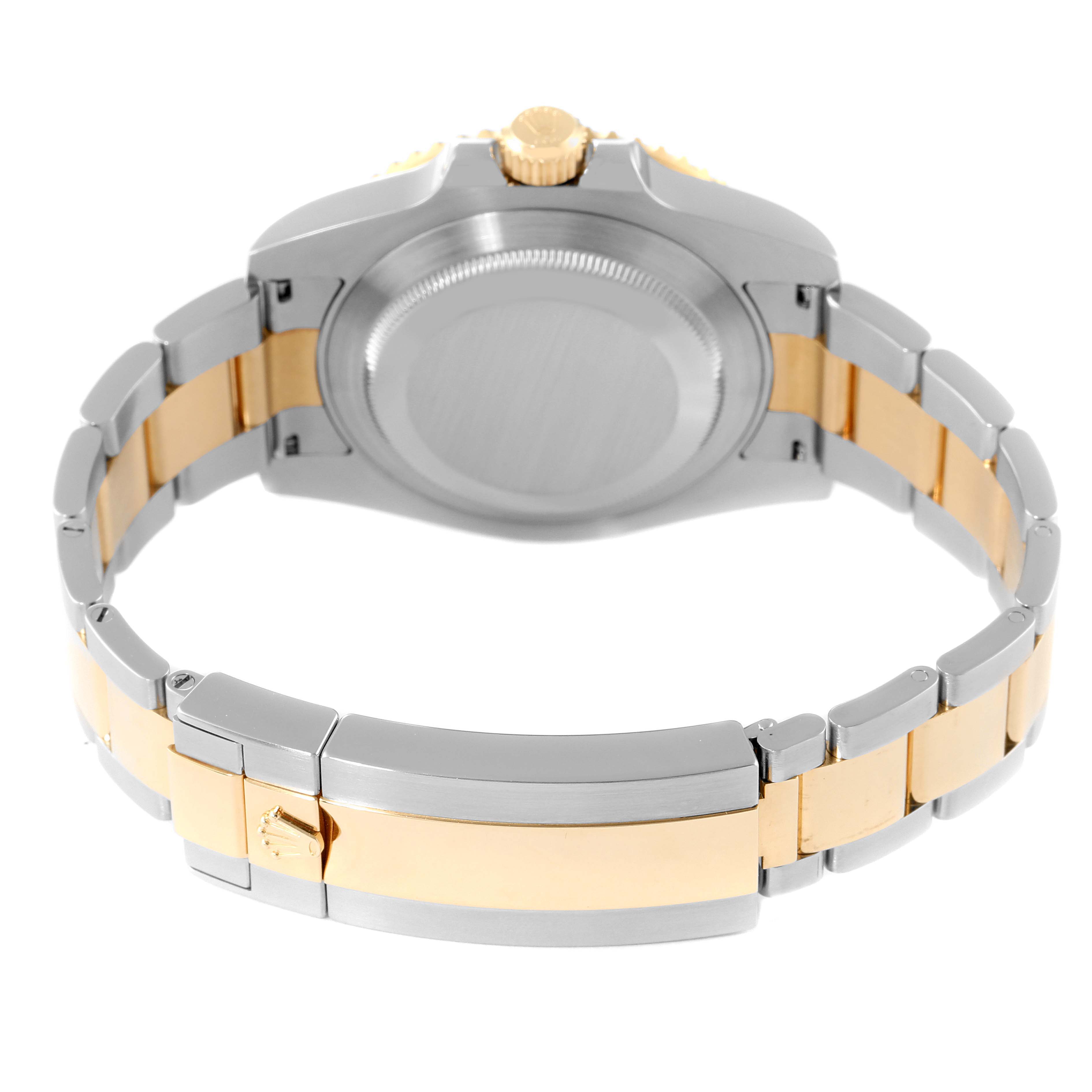 The image shows the back view of a Rolex Submariner 116613 Men's Steel and Gold (two tone) Black Dial 116613 Men's Steel and Gold (two tone) Black Dial watch, highlighting its two-tone bracelet and clasp.