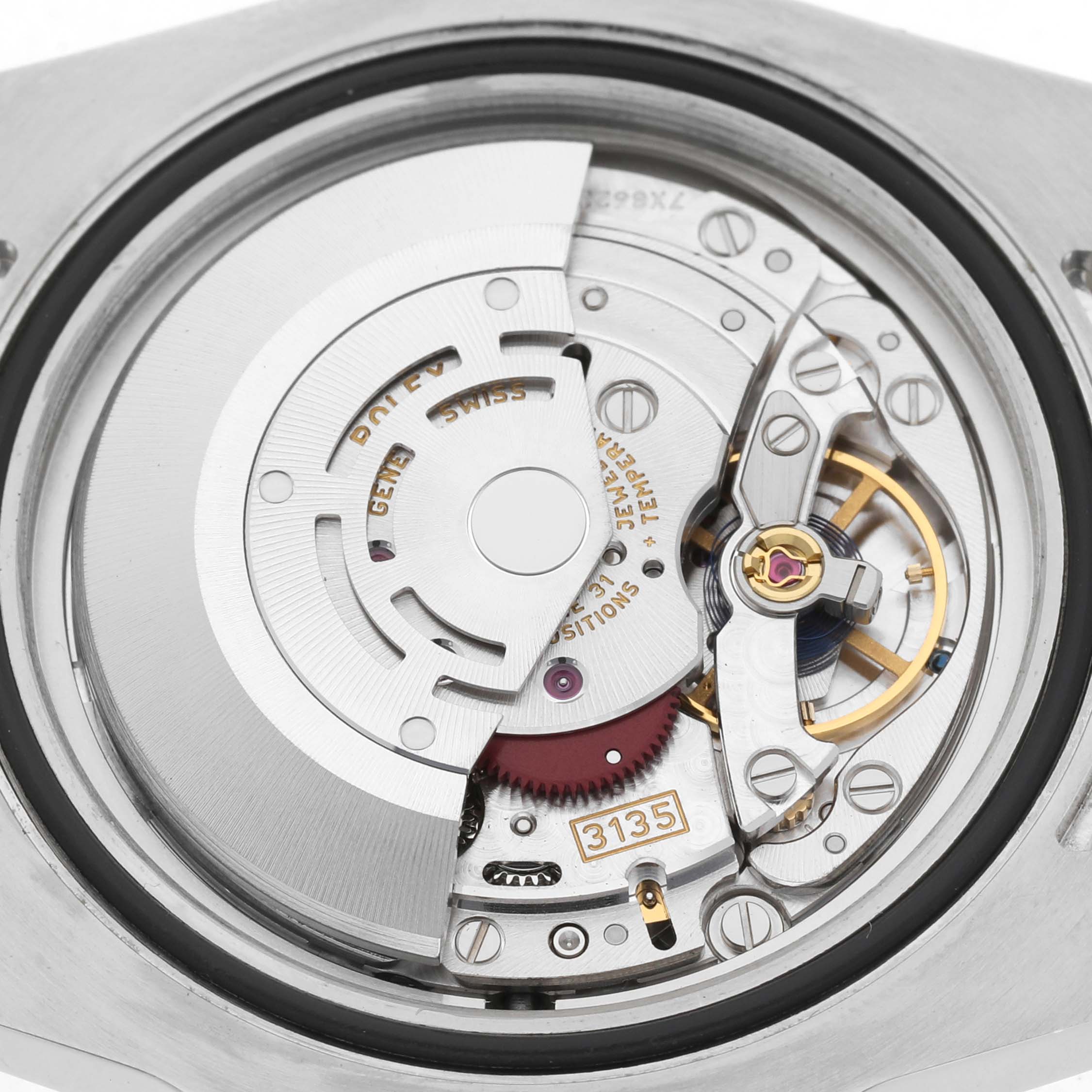 The image shows the movement mechanism of a Rolex Submariner 116613LN Men's Steel and Gold (two tone) Black Dial watch from the back, revealing gears and the rotor.
