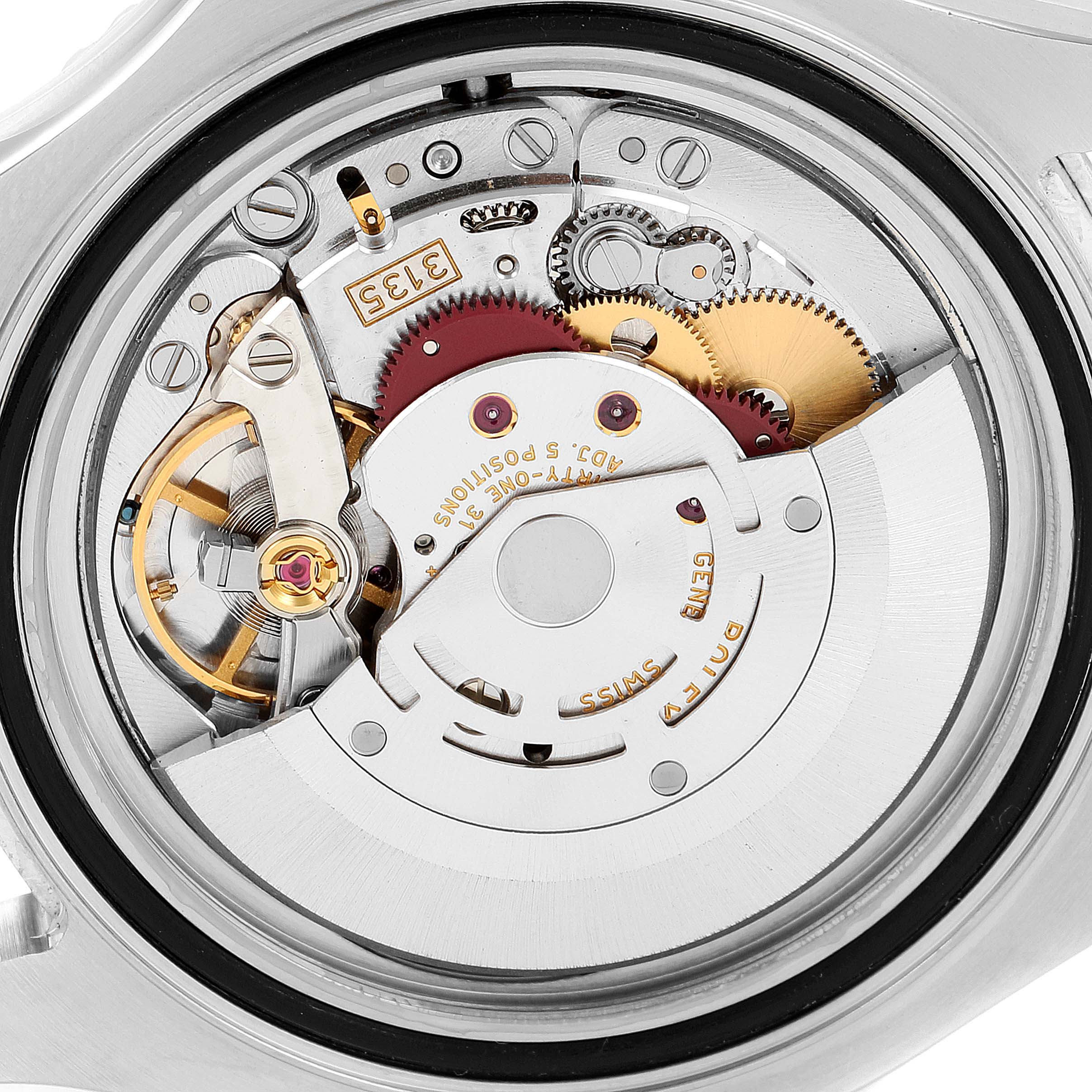 This image shows the internal mechanism of a Rolex Yacht-Master 16622 Men
s Stainless Steel Silver Dial 16622 Men
s Stainless Steel Silver Dial watch from a rear angle with exposed gears and components.