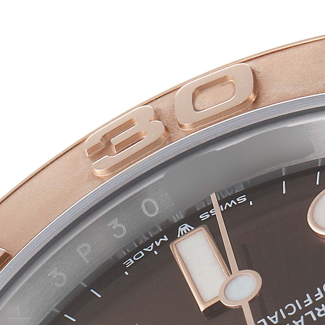 This close-up image shows part of the bezel and dial of a Rolex Yacht-Master 126621 Men's Steel and Gold (two tone) Brown Dial 126621 Men's Steel and Gold (two tone) Brown Dial watch, highlighting the "30" mark.