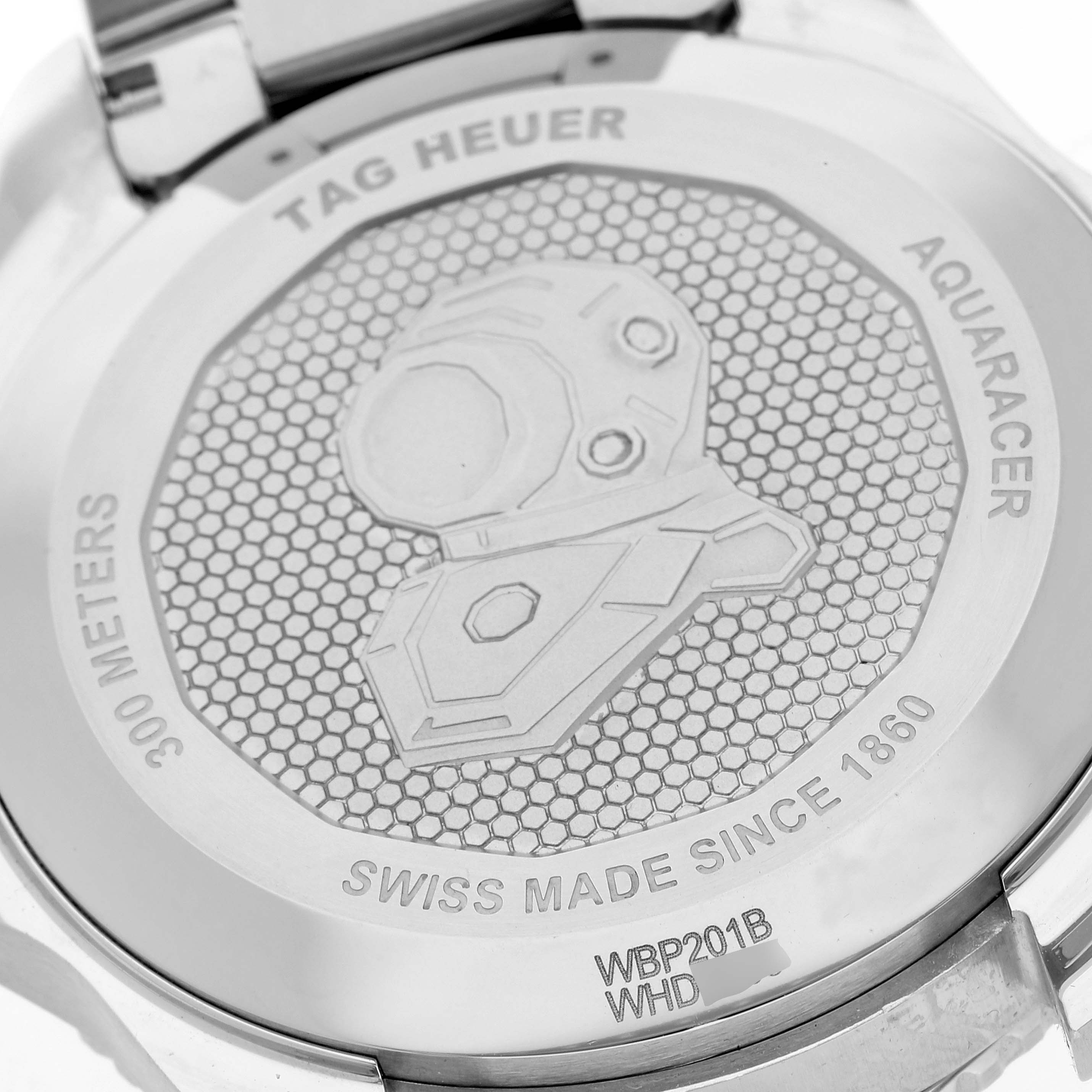 This image shows the back case of a Tag Heuer Aquaracer WBP201B.BA0632 Men
s Stainless Steel Blue Dial WBP201B.BA0632 Men
s Stainless Steel Blue Dial watch, displaying brand markings and water resistance information.
