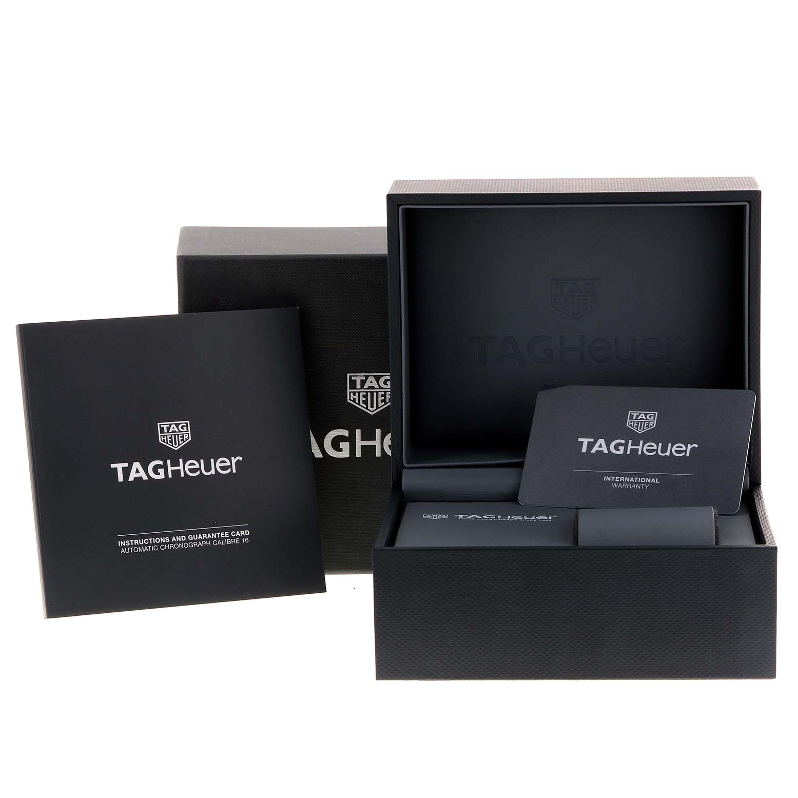 The image shows the packaging, instruction manual, and warranty card for the Tag Heuer Carrera CV201AR.BA0715 Men
s Stainless Steel Blue Dial CV201AR.BA0715 Men
s Stainless Steel Blue Dial watch model.