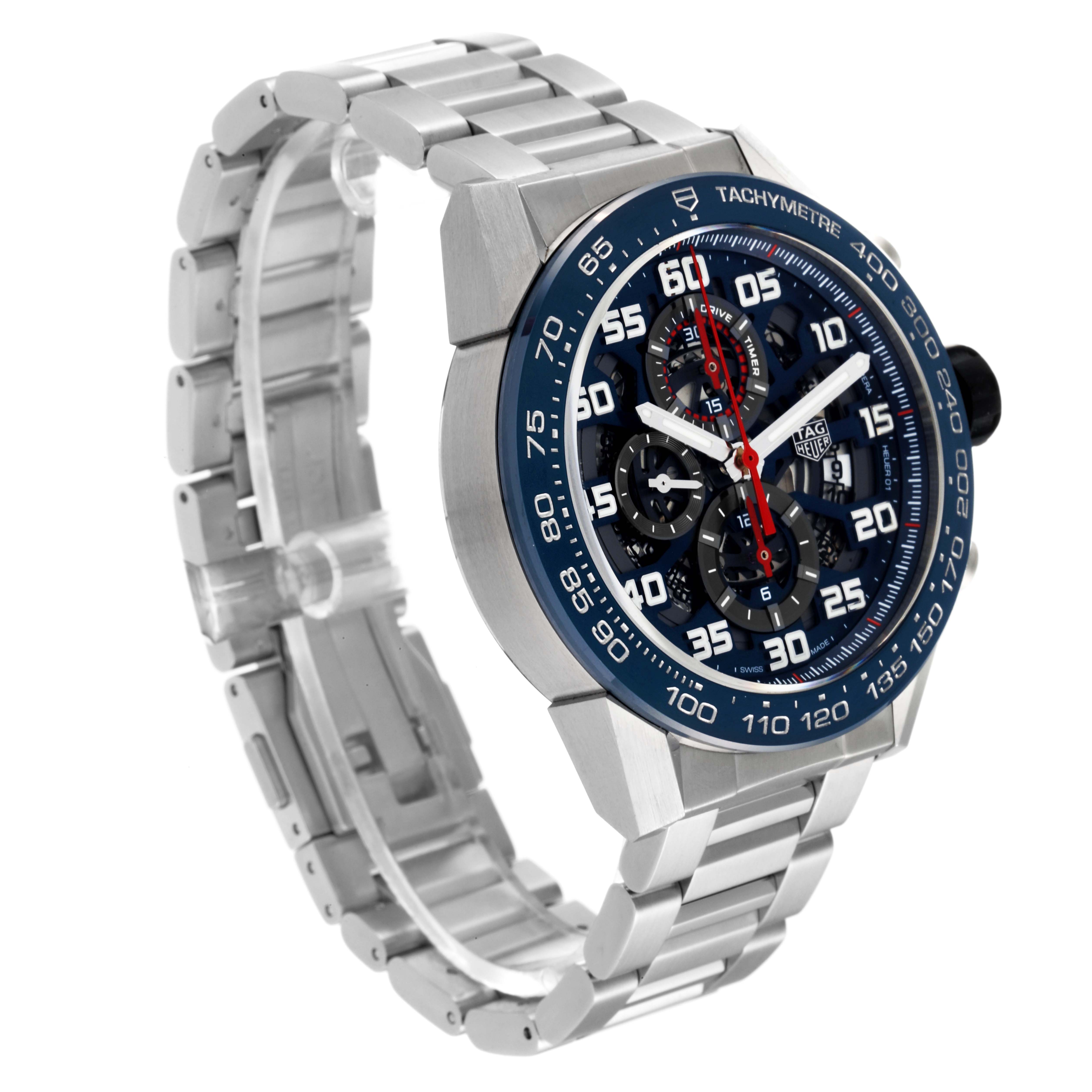 This image shows the Tag Heuer Carrera CAR2A1K.BA0703 Men's Stainless Steel Blue Dial CAR2A1K.BA0703 Men's Stainless Steel Blue Dial model watch at a three-quarter angle, highlighting its face and metal bracelet.