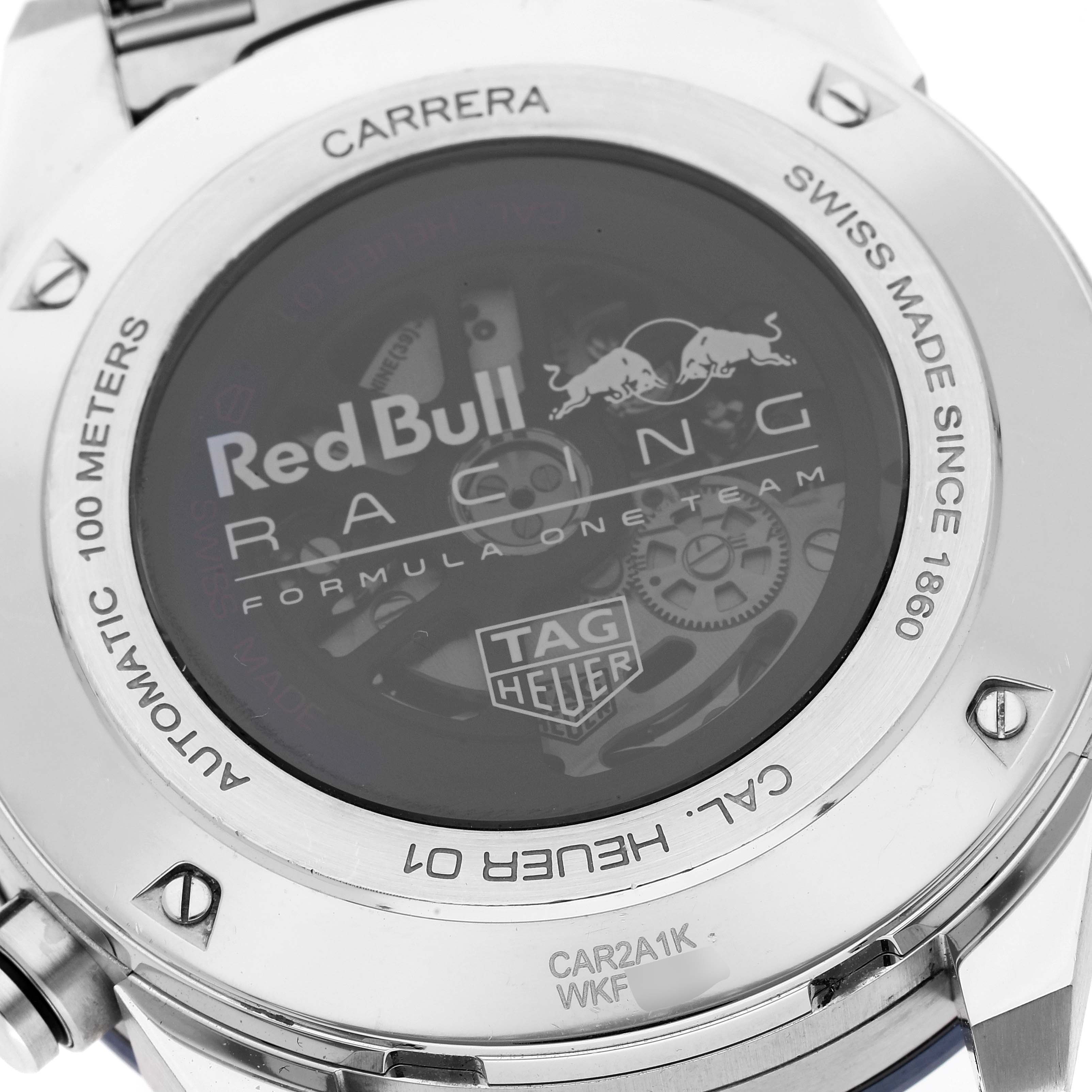 This image shows the back casing of a Tag Heuer Carrera CAR2A1K.BA0703 Men's Stainless Steel Blue Dial CAR2A1K.BA0703 Men's Stainless Steel Blue Dial watch, highlighting the Red Bull Racing collaboration and internal mechanism.