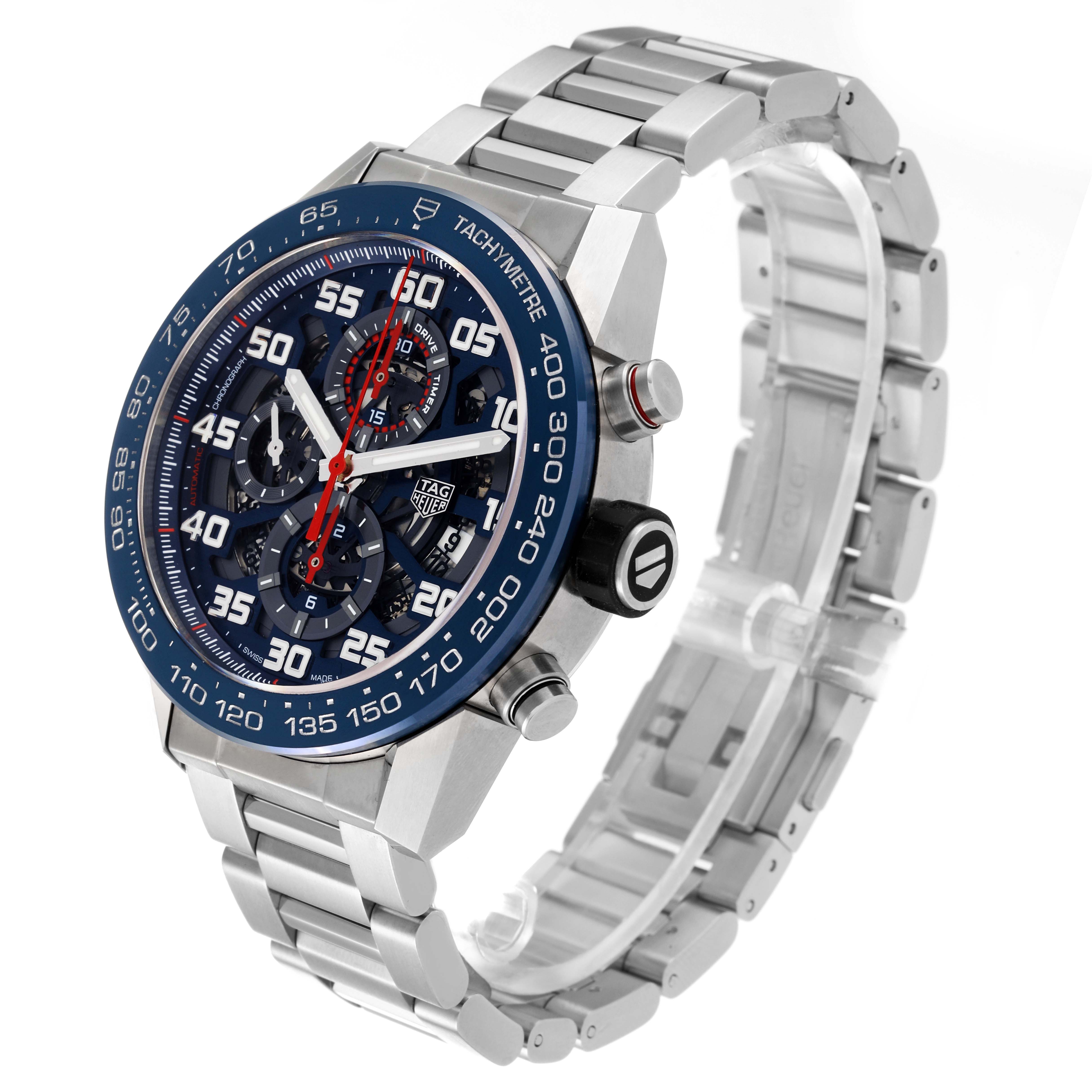 The Tag Heuer Carrera CAR2A1K.BA0703 Men's Stainless Steel Blue Dial CAR2A1K.BA0703 Men's Stainless Steel Blue Dial watch is shown at a three-quarter angle, displaying its face, bezel, crown, and metal bracelet.