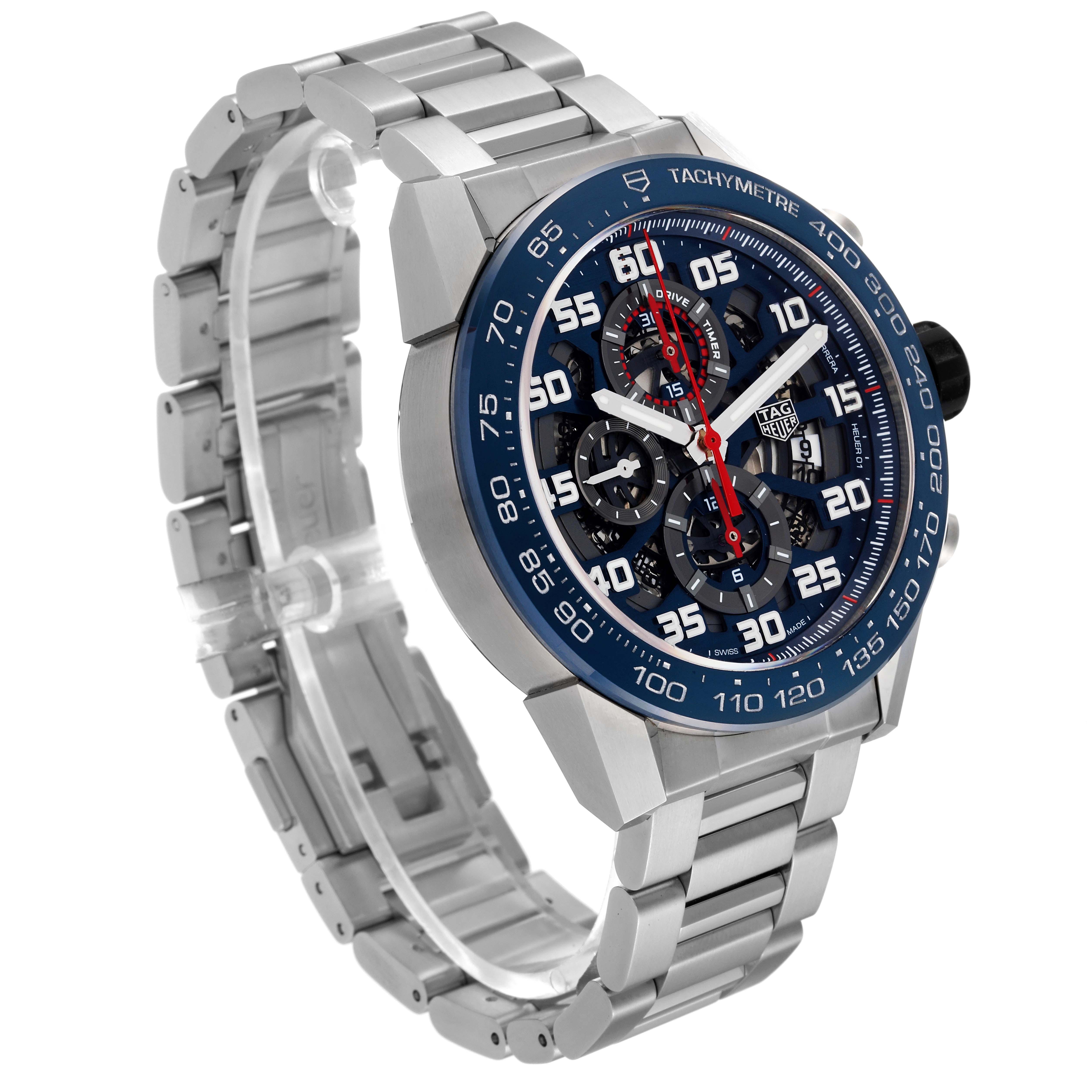 The image shows a side angle of a Tag Heuer Carrera CAR2A1K.BA0703 Men's Stainless Steel Blue Dial CAR2A1K.BA0703 Men's Stainless Steel Blue Dial watch, highlighting the face, bezel, and stainless steel bracelet.
