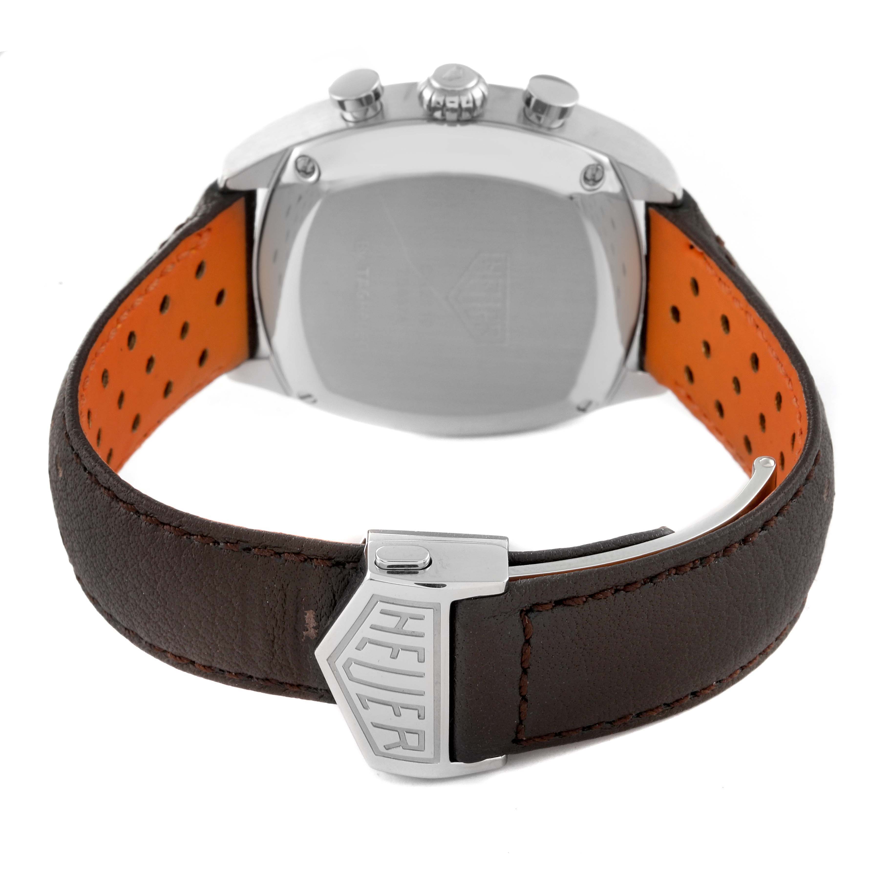 The image shows the back view of the Tag Heuer Monza CR2110 Men's Stainless Steel Black Dial CR2110 Men's Stainless Steel Black Dial watch, highlighting the clasp, leather strap, and the case back.