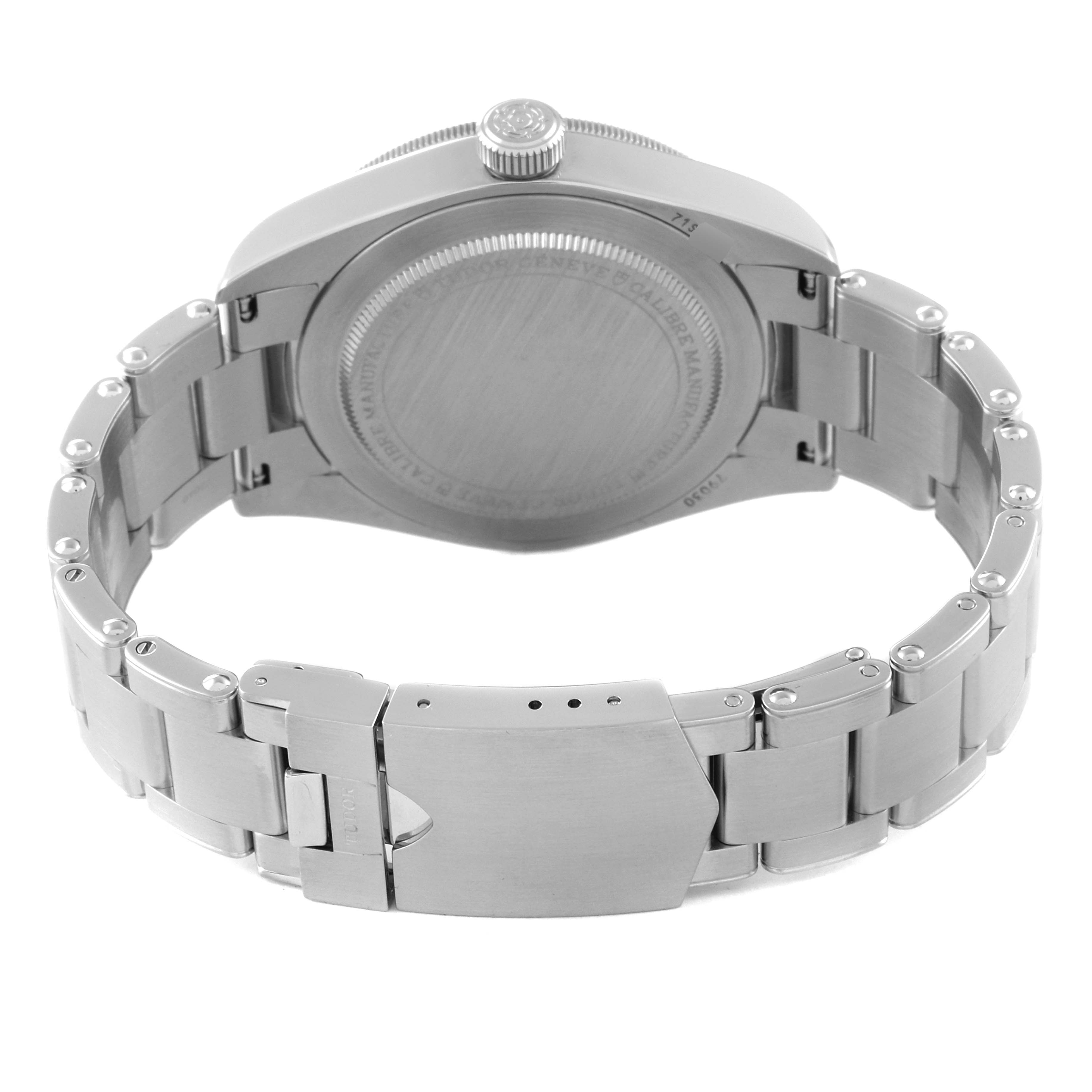 The image shows the back view of a Tudor Heritage Black Bay M79030N-0001 Men
s Stainless Steel Black Dial M79030N-0001 Men
s Stainless Steel Black Dial watch, featuring the case back and metal bracelet clasp.