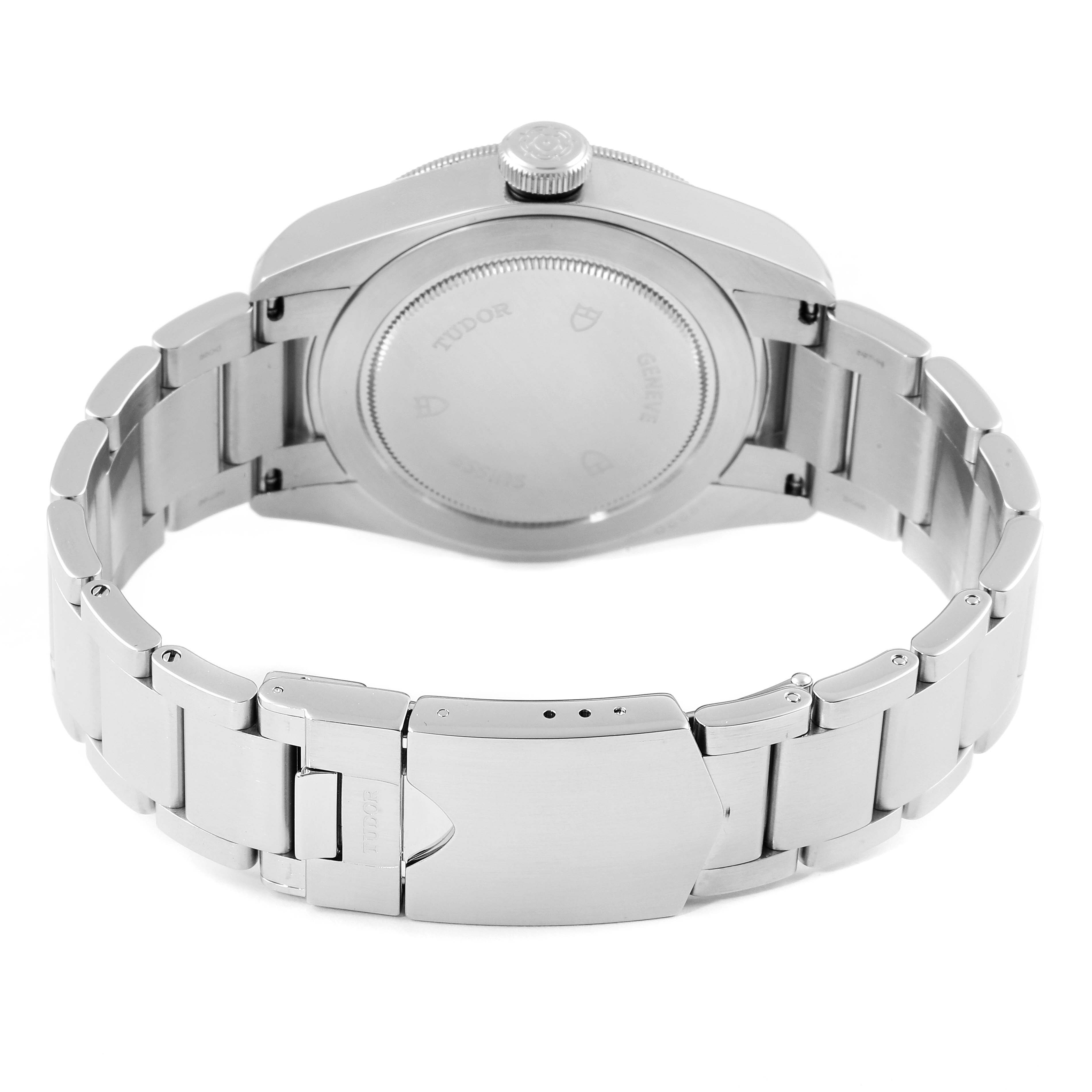 The image shows the back casing and bracelet of a Tudor Heritage Black Bay 79220 Men's Stainless Steel Black Dial 79220 Men's Stainless Steel Black Dial watch from a rear angle.