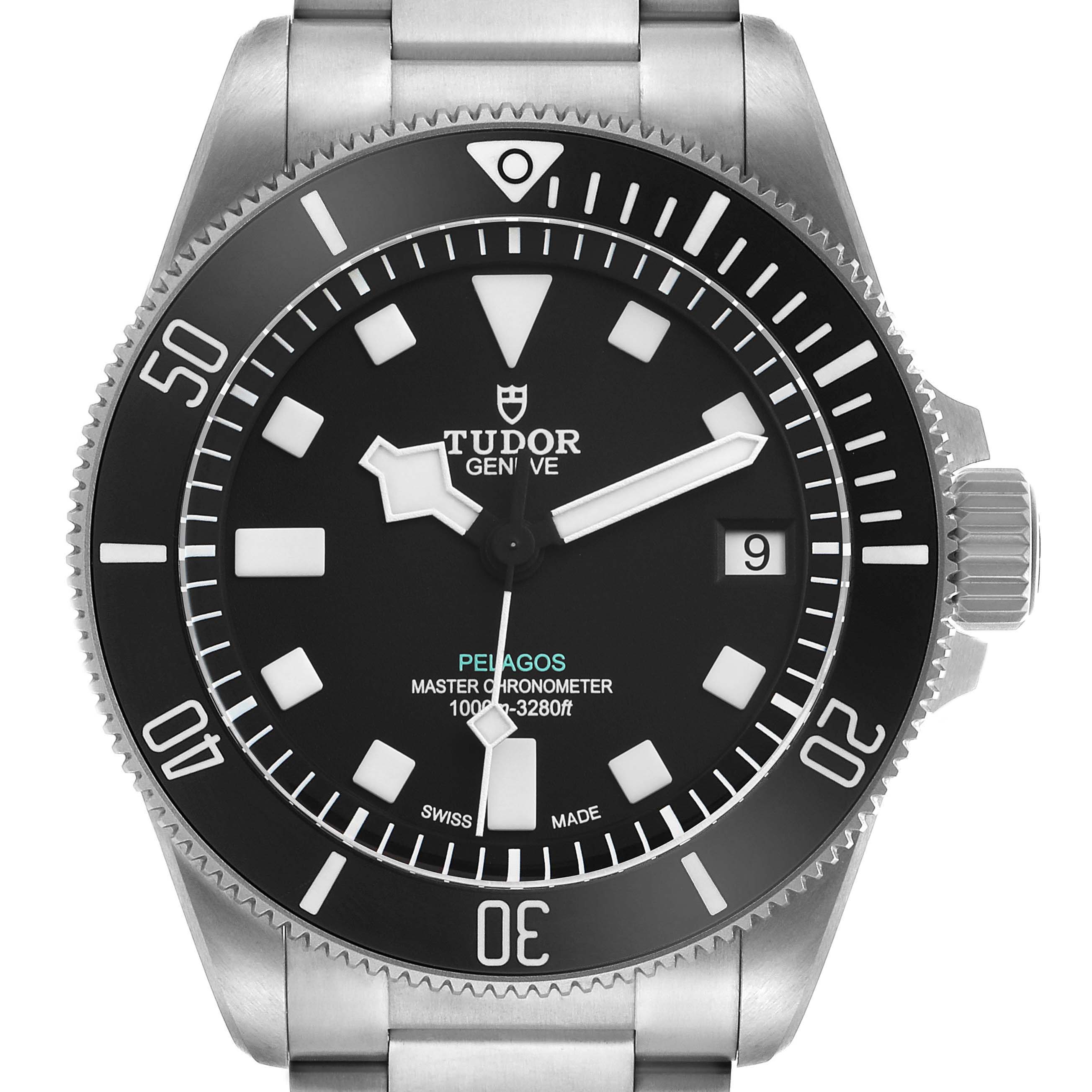 The image shows a frontal view of a Tudor Pelagos M2543C1A7NU-0001 Men's Titanium Black Dial watch, highlighting the dial, bezel, and crown.