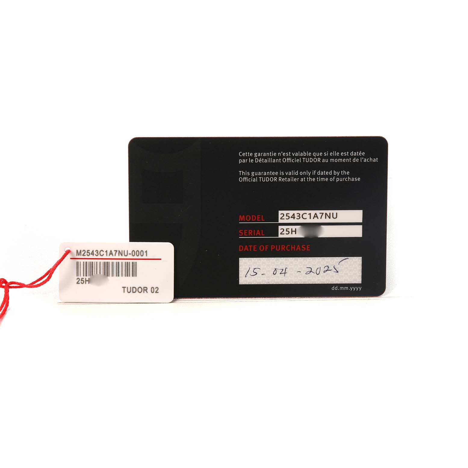 This image shows a Tudor Pelagos M2543C1A7NU-0001 Men's Titanium Black Dial model's warranty card from a front angle with serial and purchase details.