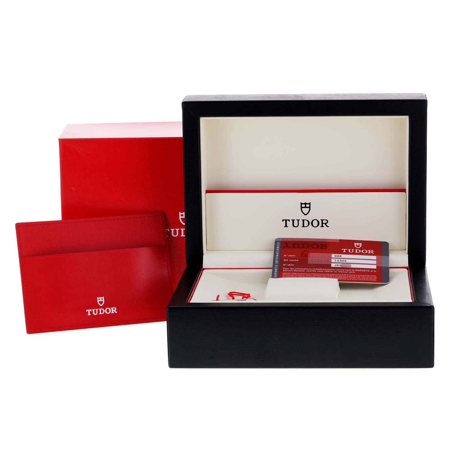 The image shows the box, warranty card, cardholder, and packaging for the Tudor Style M12303 Women
s Steel and Gold (two tone) Black Dial M12303 Women
s Steel and Gold (two tone) Black Dial model watch.