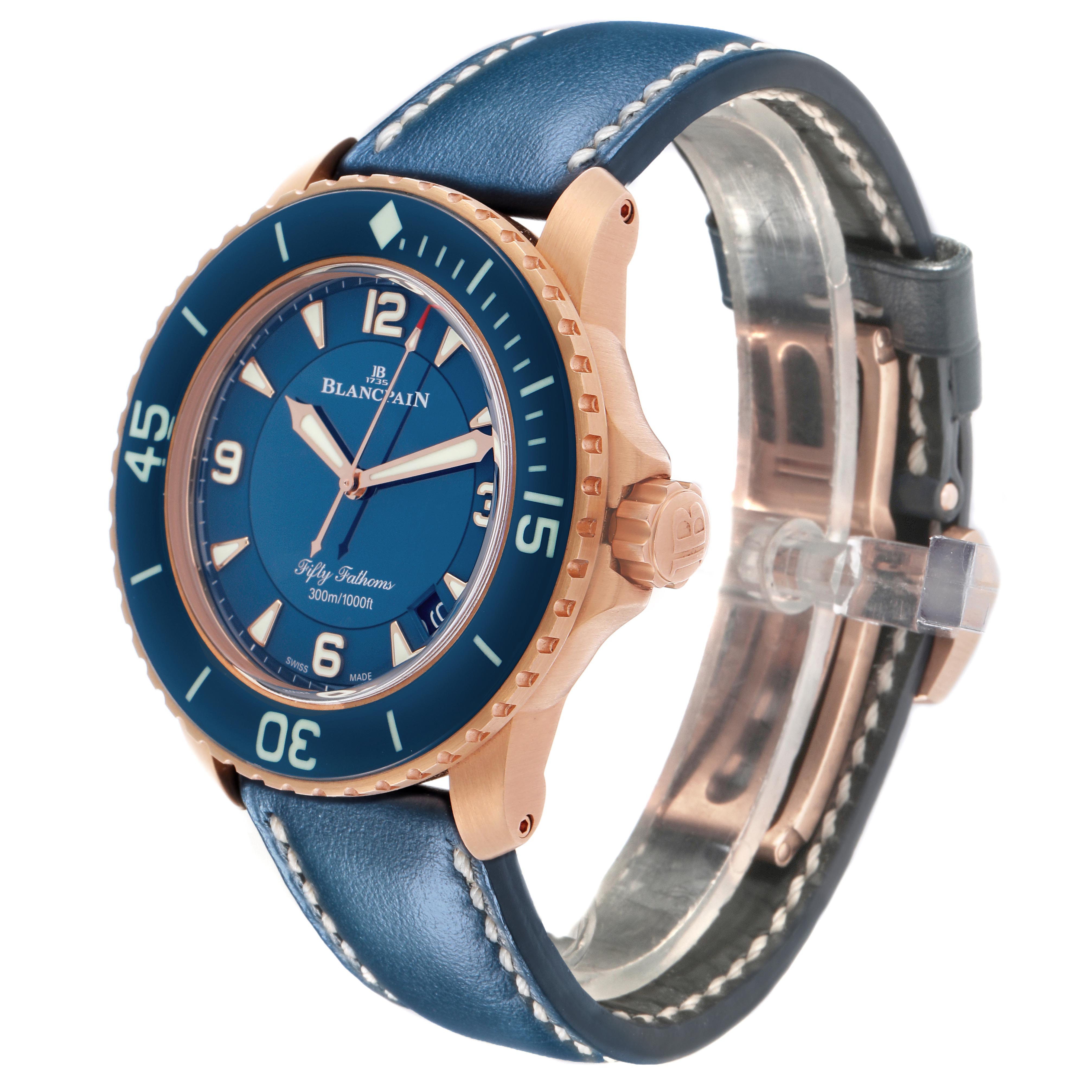 The Blancpain Fifty Fathoms 5015-363-C63B Men's Rose Gold Blue Dial 5015-363-C63B Men's Rose Gold Blue Dial watch is shown at an angled view, highlighting the blue dial, bezel, rose gold case, and leather strap.