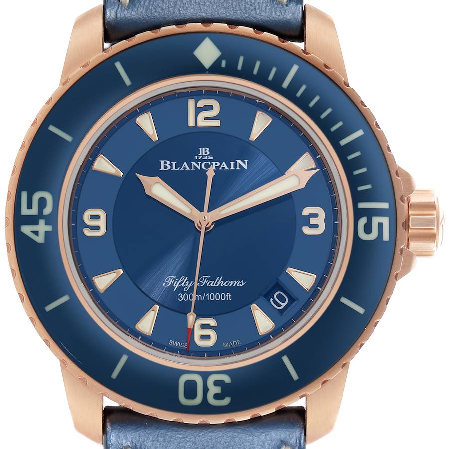 The Blancpain Fifty Fathoms watch is shown from a front angle, highlighting the dial, bezel, and crown.