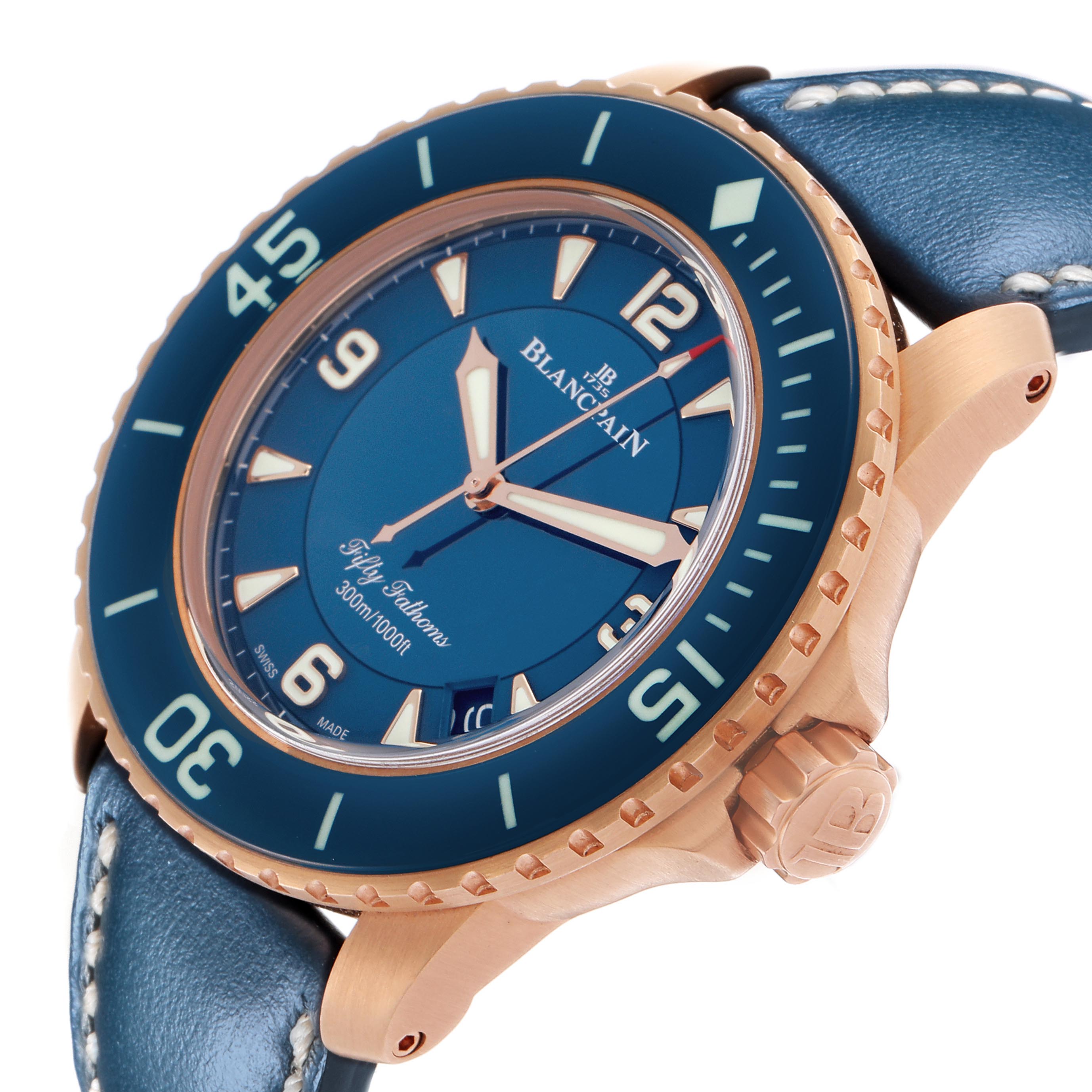 The Blancpain Fifty Fathoms 5015-363-C63B Men's Rose Gold Blue Dial 5015-363-C63B Men's Rose Gold Blue Dial watch is shown at a three-quarter angle, highlighting the blue dial, bezel, crown, and leather strap.