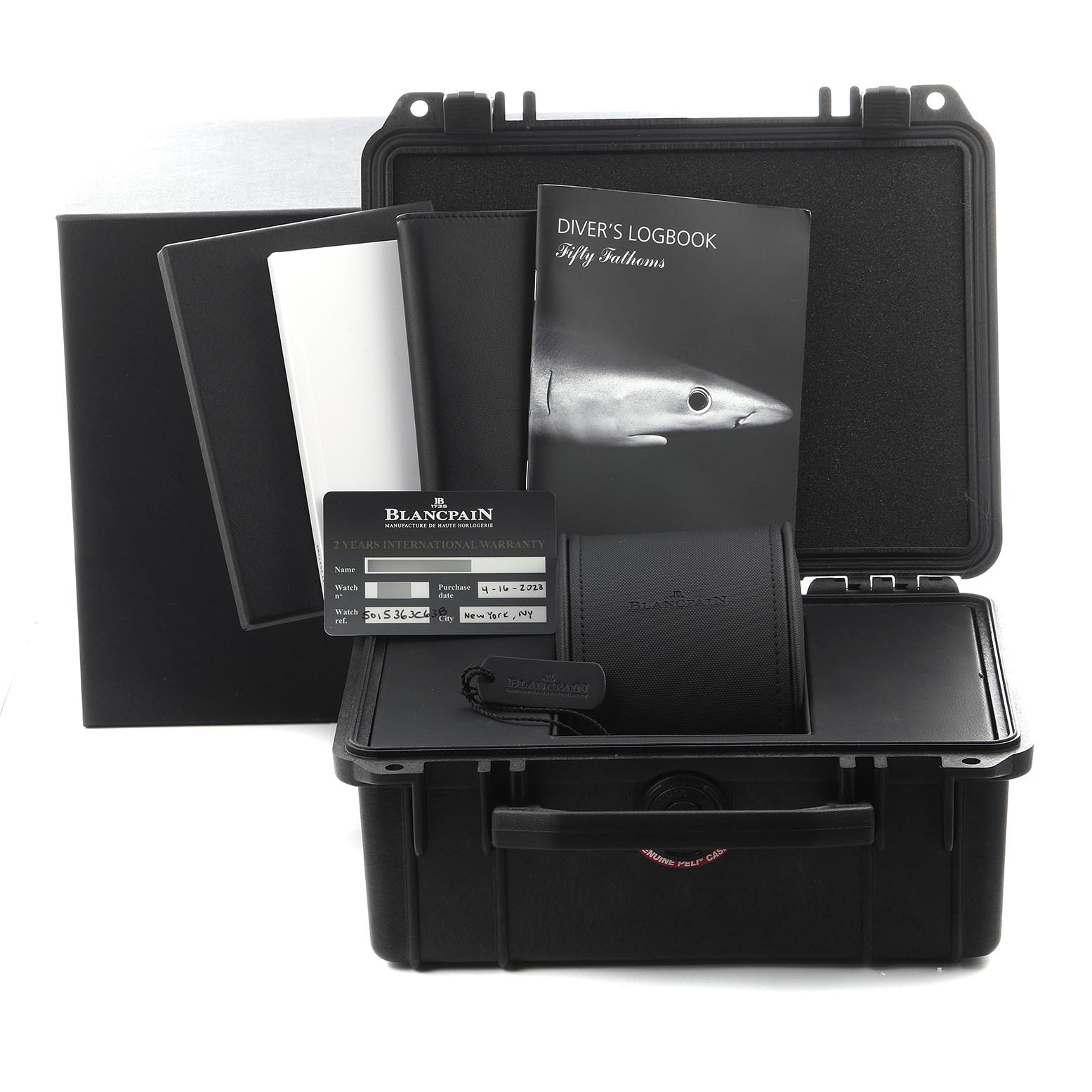 The image shows the Blancpain Fifty Fathoms 5015-363-C63B Men's Rose Gold Blue Dial 5015-363-C63B Men's Rose Gold Blue Dial accessories, including a warranty card, diver's logbook, case, and holder, from a front angle.