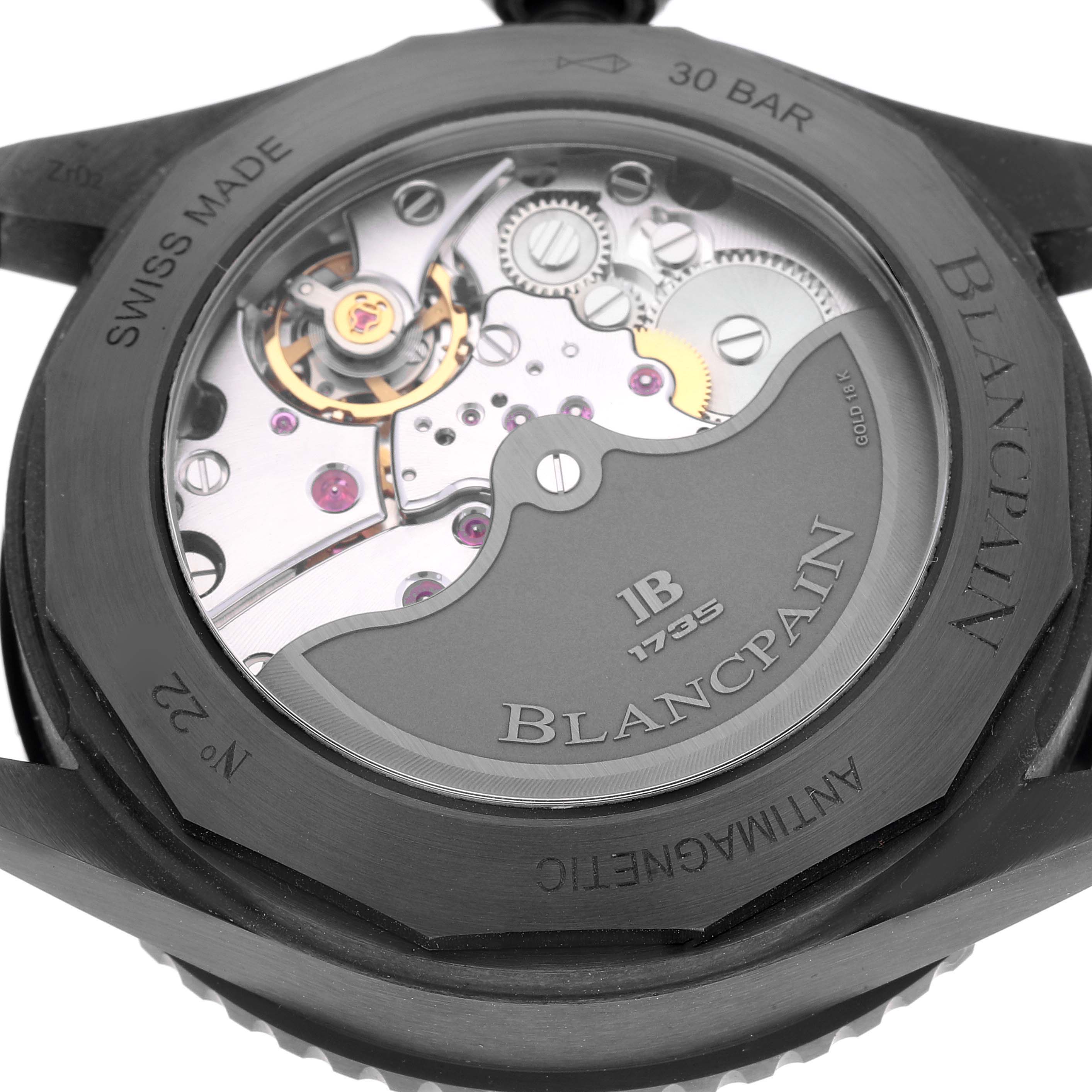 The image shows the back view of a Blancpain Fifty Fathoms 5000-0130-B52A Men
s Ceramic Black Dial 5000-0130-B52A Men
s Ceramic Black Dial watch, revealing its intricate mechanical movement and branding.