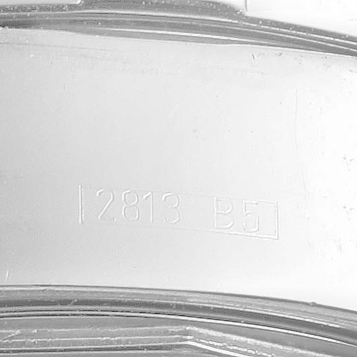 This image shows the engraved serial number "2813 B5" on the case back of the Breitling Superocean A13340 Men's Stainless Steel Beige Dial A13340 Men's Stainless Steel Beige Dial watch.