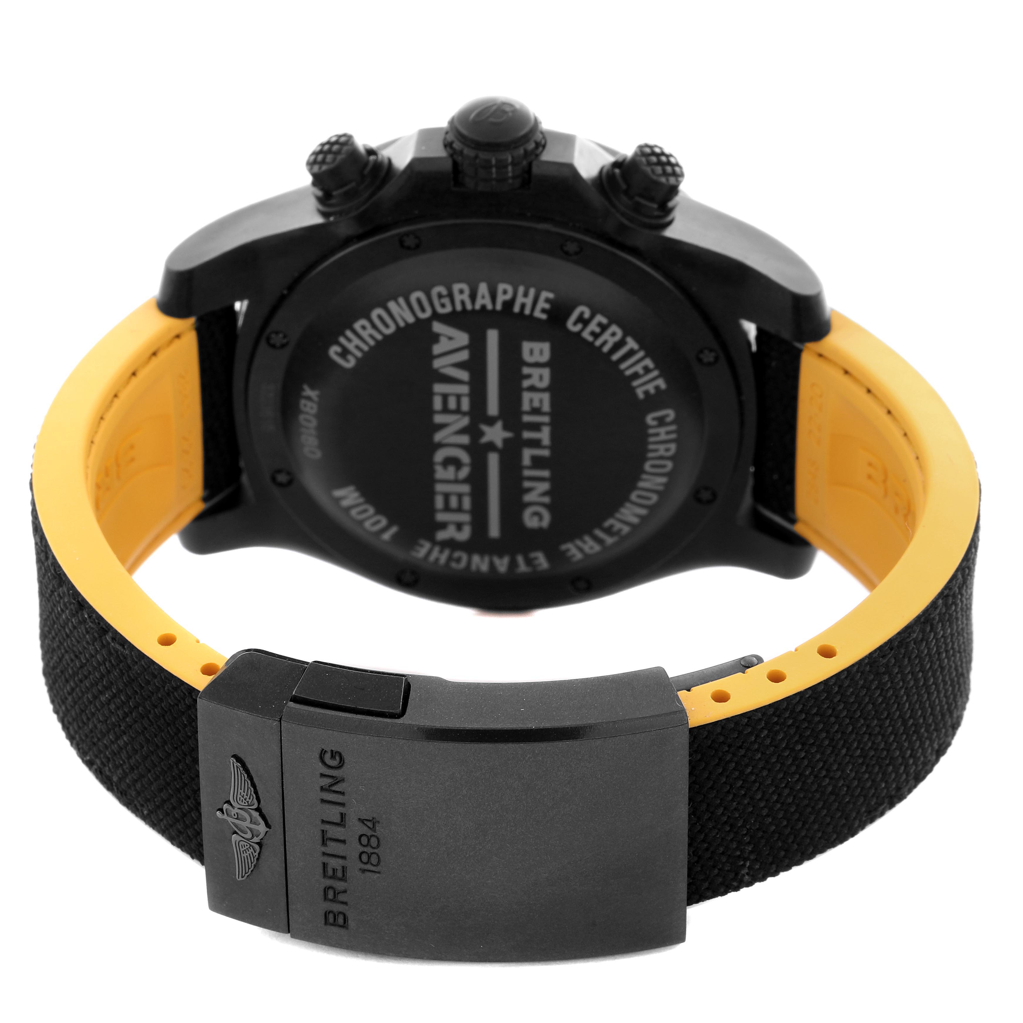 The Breitling Avenger XB0180 Men's Ceramic Black Dial XB0180 Men's Ceramic Black Dial watch is shown from the back, displaying the case back, clasp, and part of the black and yellow band.
