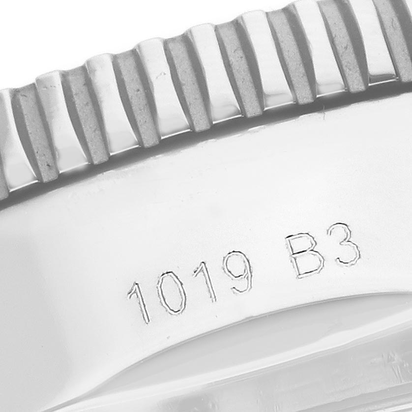 The image shows a close-up of the bezel and engraving on the side of a Breitling Superocean AB202012-B1S1 Men
s Stainless Steel Black Dial AB202012-B1S1 Men
s Stainless Steel Black Dial watch.