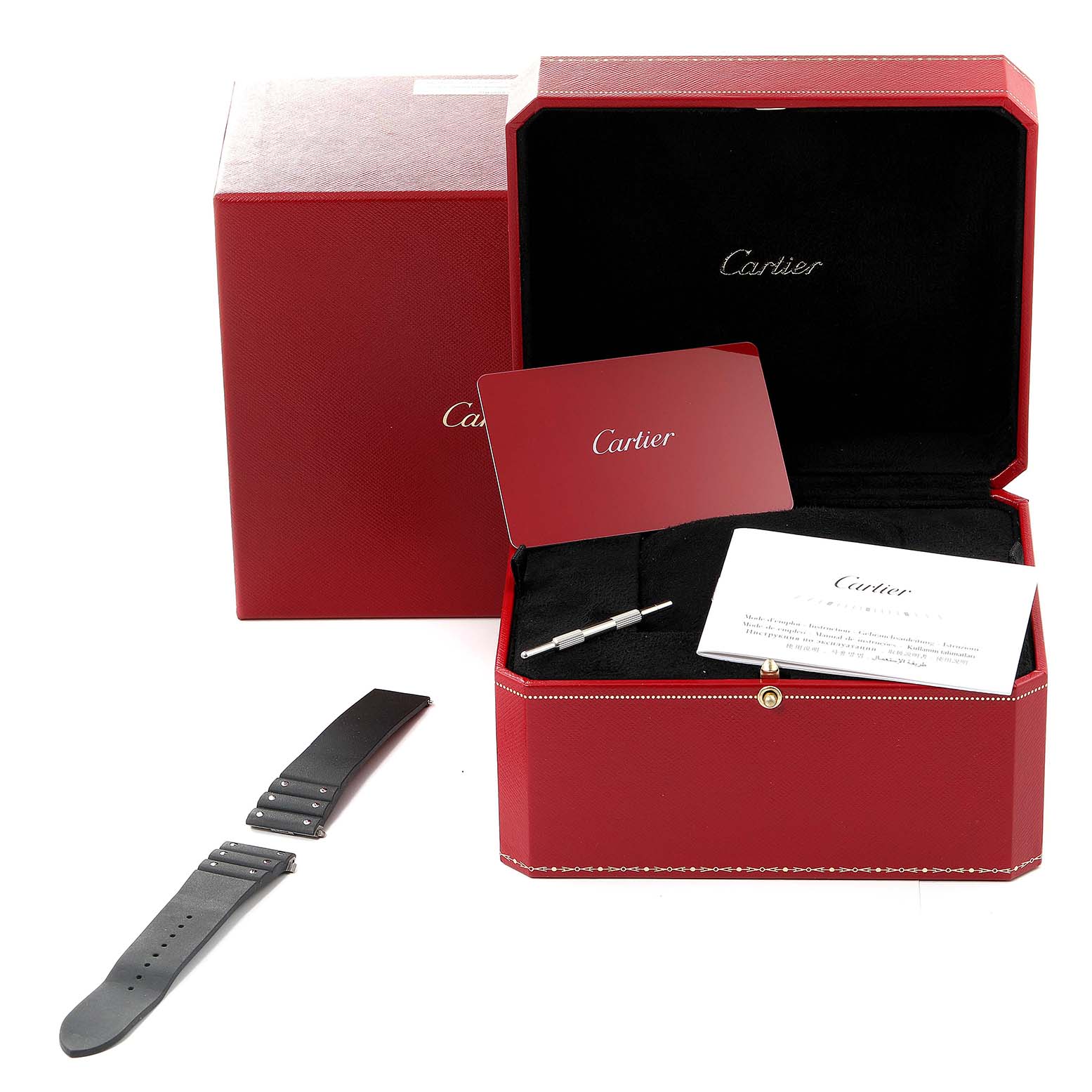 The image shows a Cartier Santos WSSA0039 Men's Stainless Steel Black Dial WSSA0039 Men's Stainless Steel Black Dial watch package, box, extra strap, tool, card, and documents, all from a side angle.