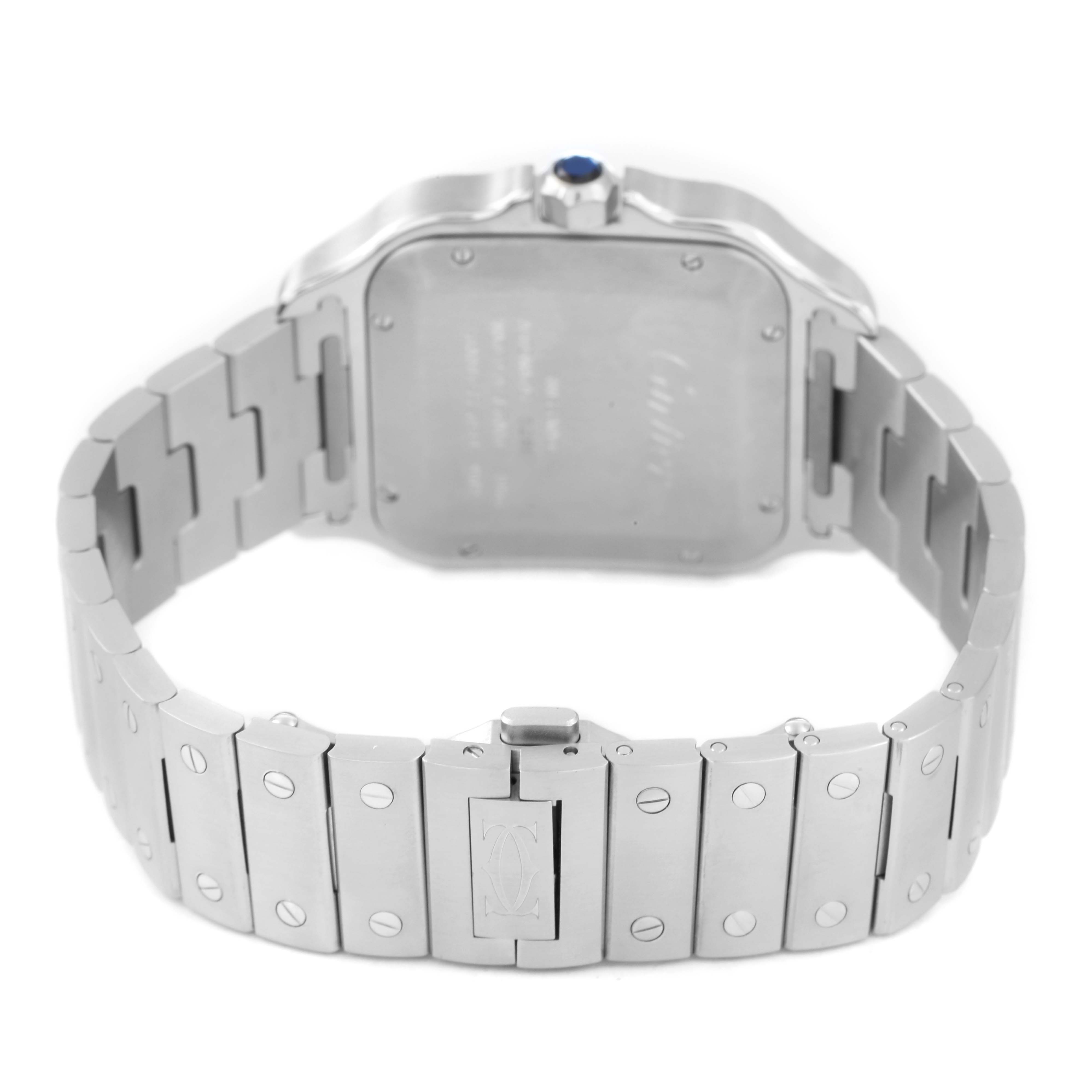 The image shows the back case and bracelet of a Cartier Santos WSSA0018 Men's Stainless Steel Silver Dial watch, highlighting the clasp and screw details.