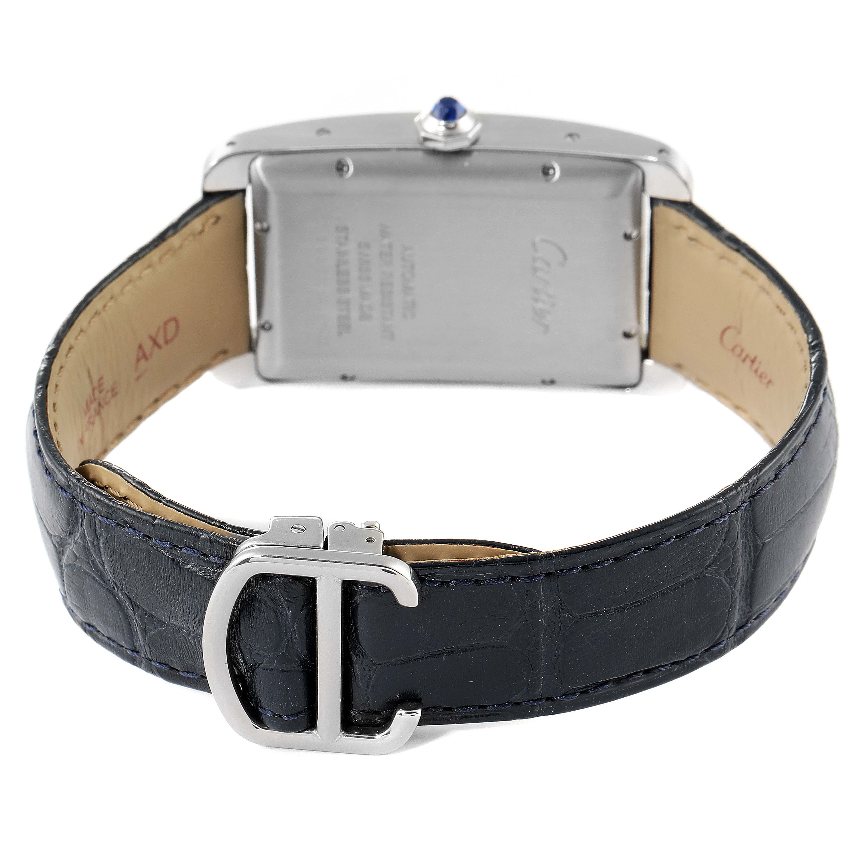 The image shows the back view of a Cartier Tank Americaine WSTA0018 Men's Stainless Steel Silver Dial WSTA0018 Men's Stainless Steel Silver Dial watch, highlighting the leather strap and buckle.