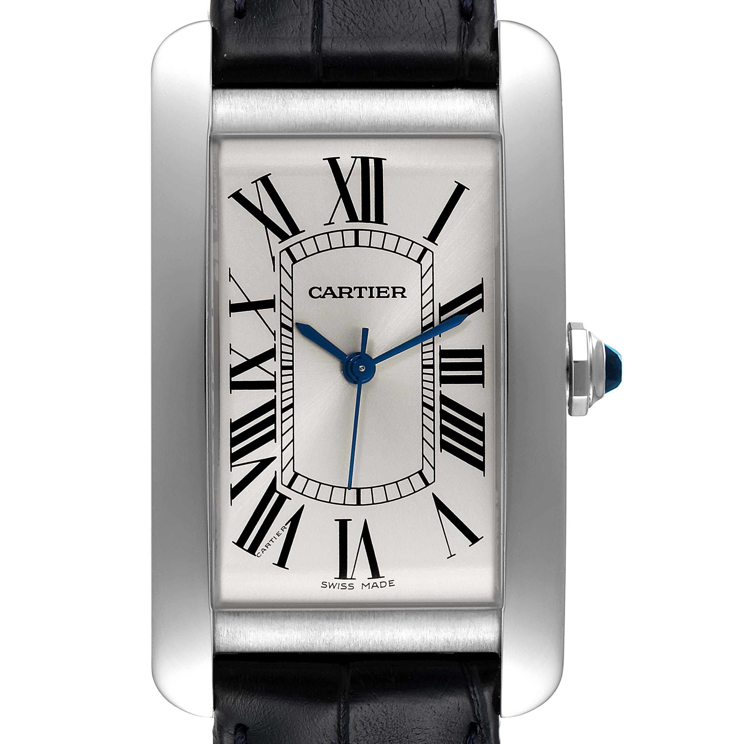 The image shows a front view of the Cartier Tank Americaine WSTA0018 Men's Stainless Steel Silver Dial WSTA0018 Men's Stainless Steel Silver Dial watch, highlighting its dial, Roman numerals, and blue hands.