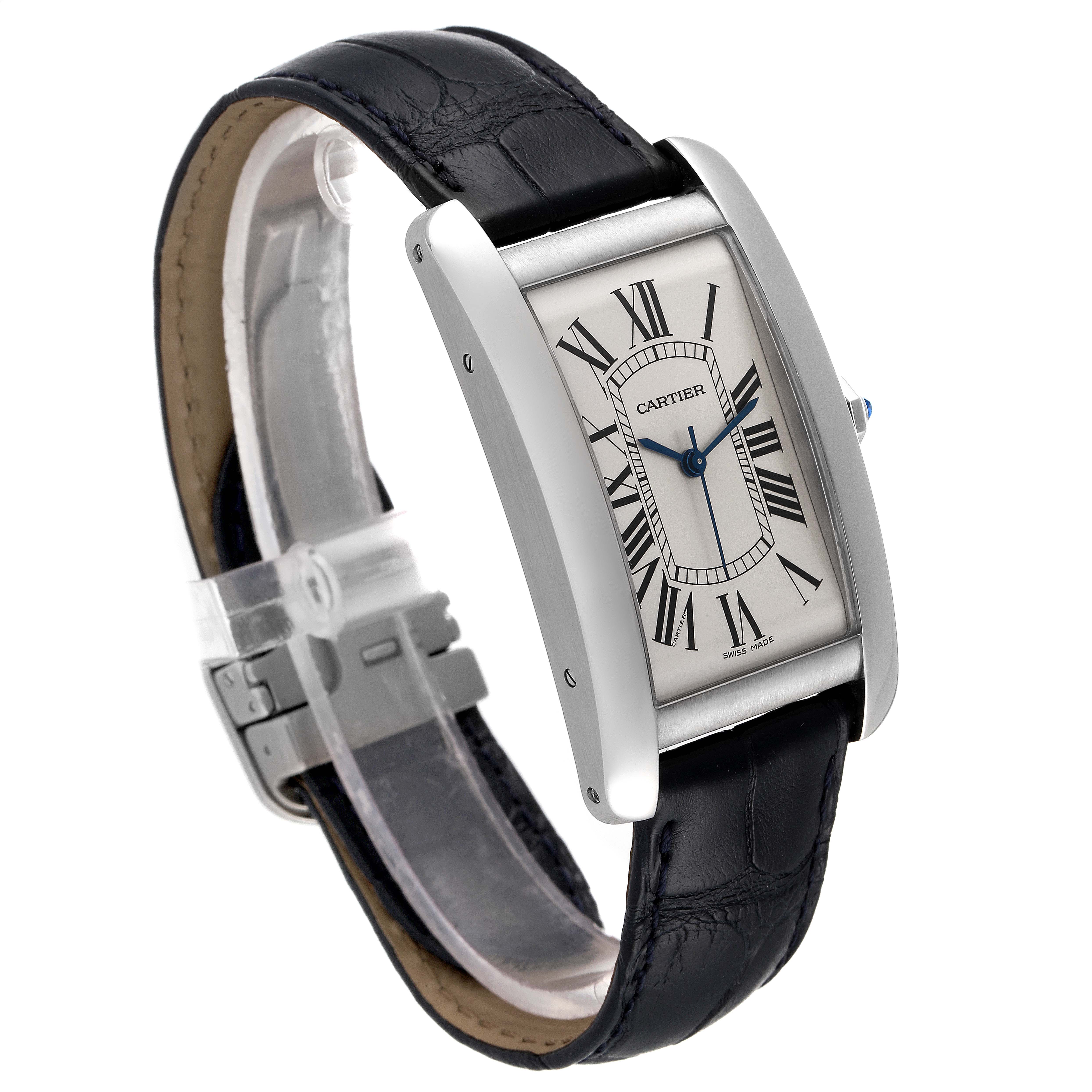 The image shows a Cartier Tank Americaine WSTA0018 Men's Stainless Steel Silver Dial WSTA0018 Men's Stainless Steel Silver Dial watch with a side angle, displaying the face, strap, and deployment clasp.