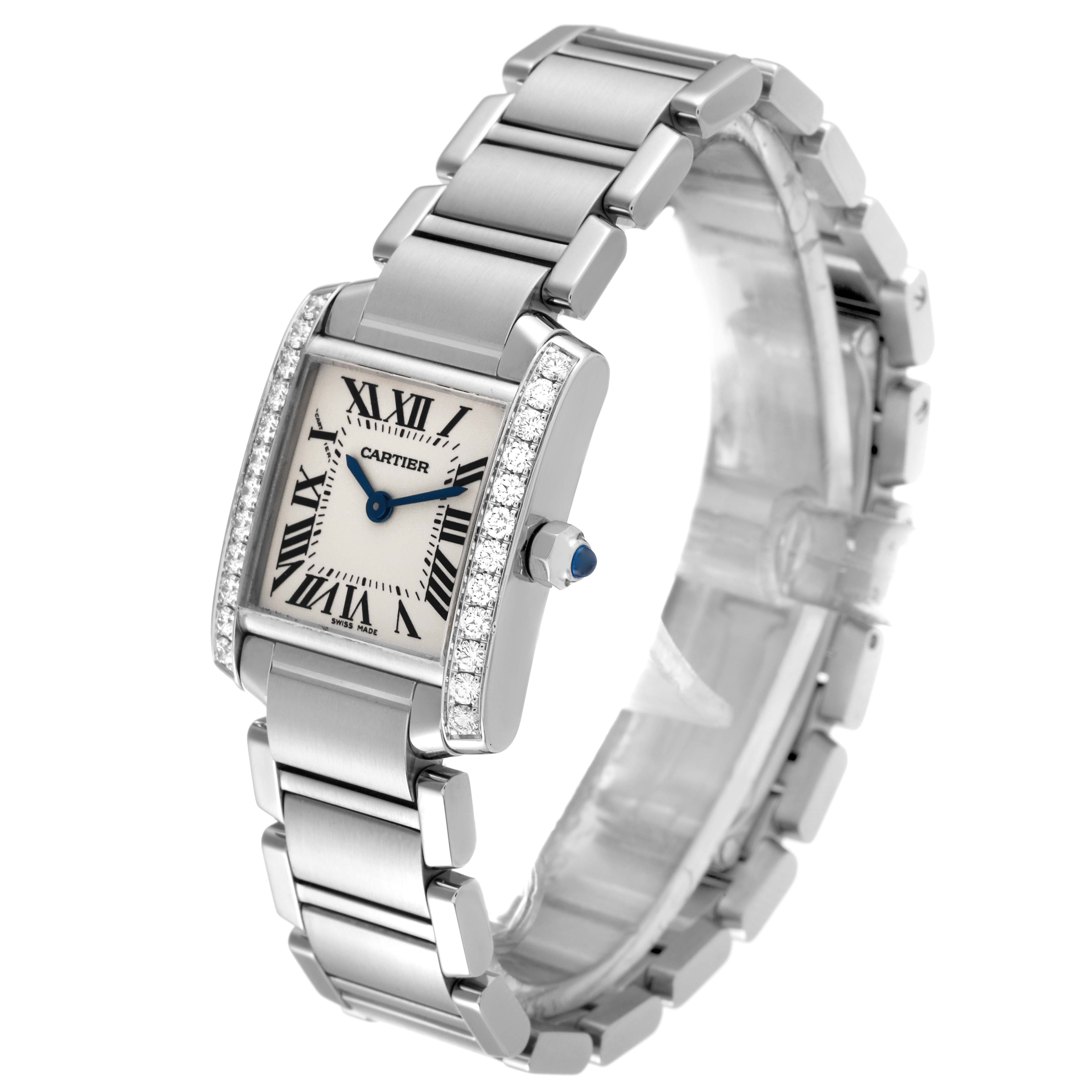 The image shows a Cartier Tank Francaise W4TA0008 Men's Stainless Steel Silver Dial W4TA0008 Men's Stainless Steel Silver Dial watch at an angled view, highlighting its diamond-studded bezel, bracelet, and dial.