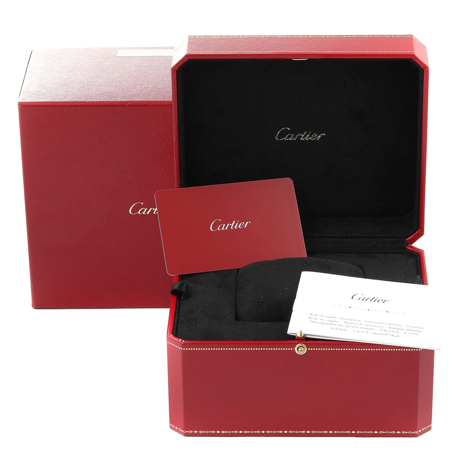 This image shows the packaging and accessories for the Cartier Tank MC WSTA0010 Men's Stainless Steel Blue Dial WSTA0010 Men's Stainless Steel Blue Dial watch, including a red box, a card, and documentation.