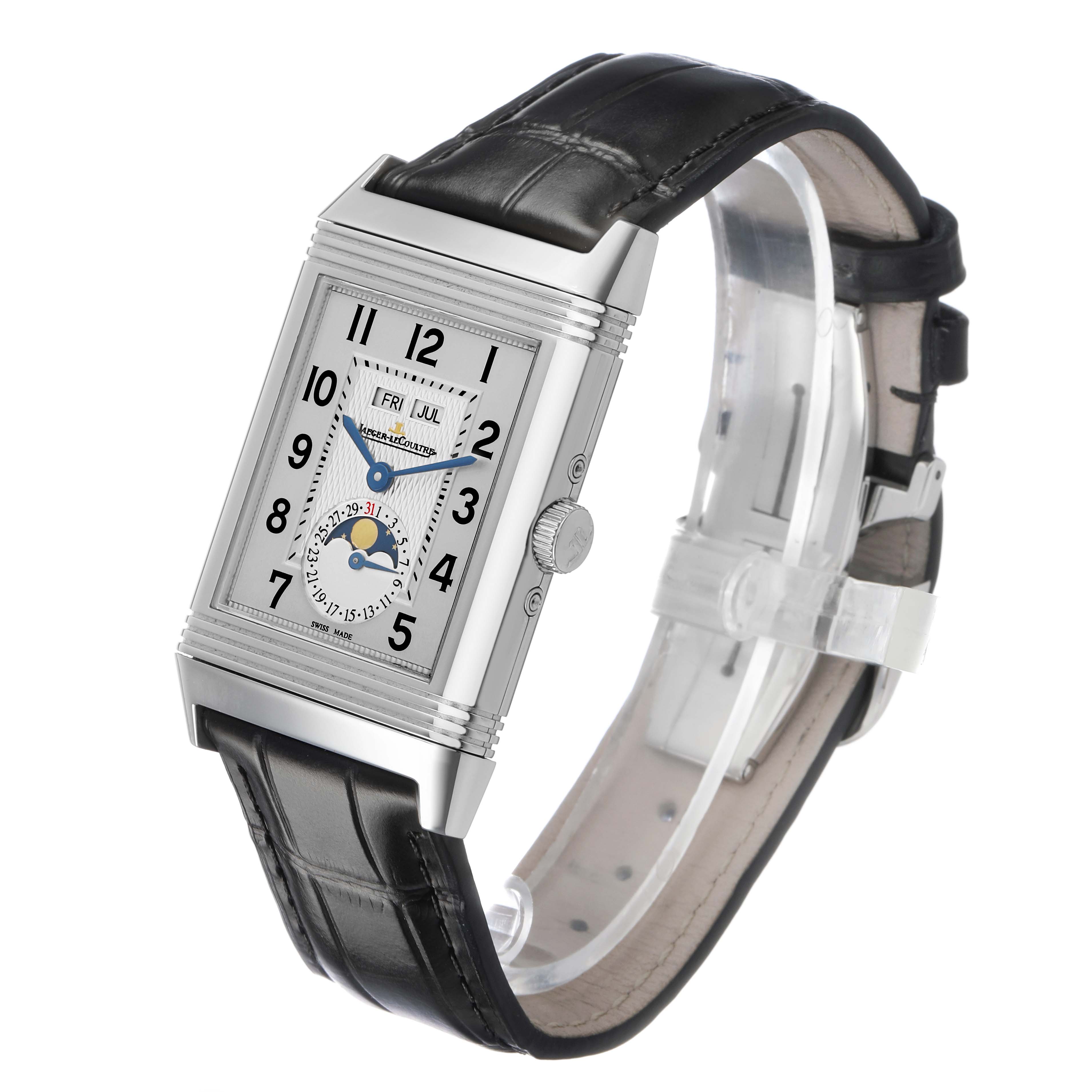 The Jaeger-LeCoultre Reverso watch is shown at a three-quarter angle, highlighting the face, crown, and leather strap.