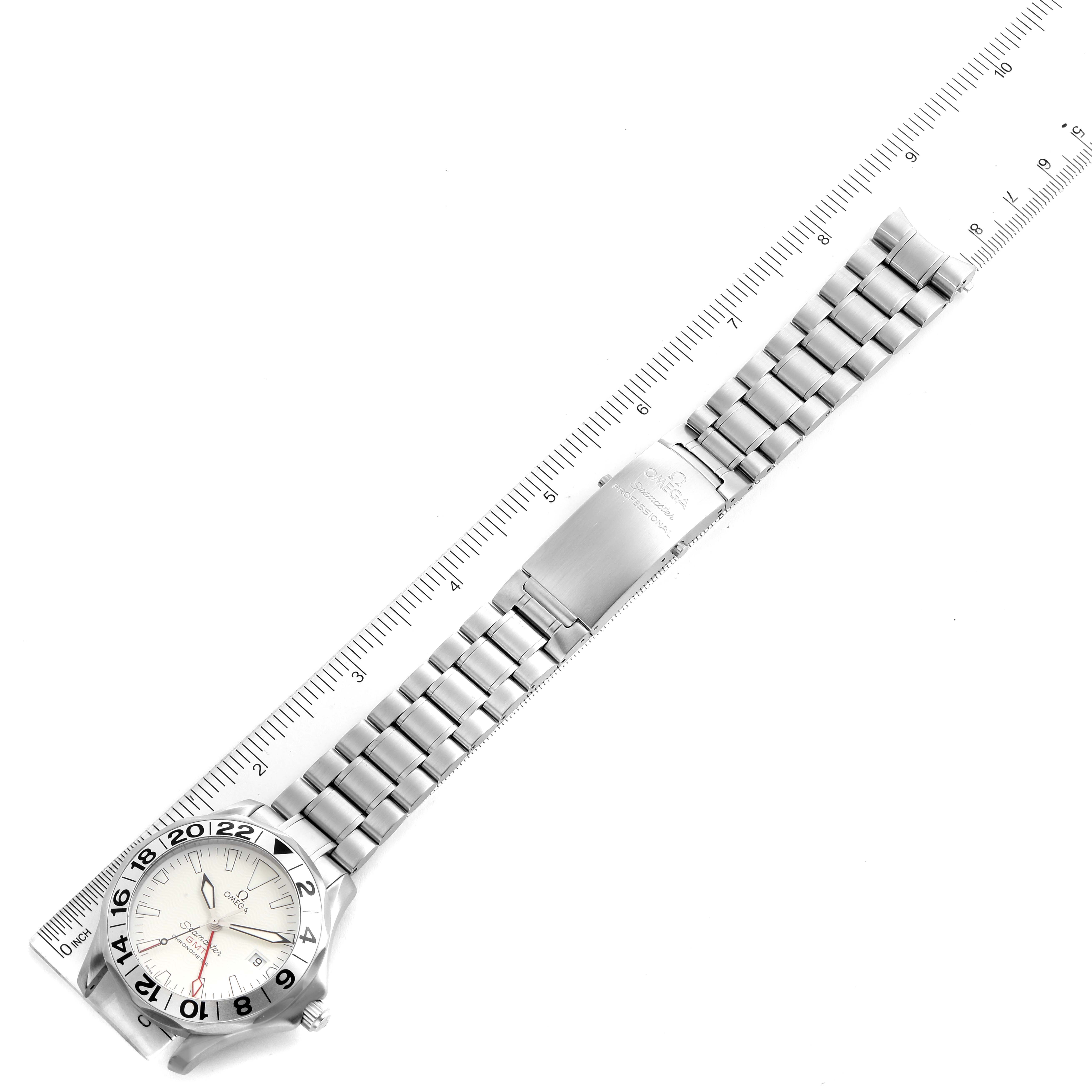 The Omega Seamaster 2538.20.00 Men
s Stainless Steel White Dial 2538.20.00 Men
s Stainless Steel White Dial watch is shown from the top view, featuring the face and metal bracelet along with a portion of a ruler for scale.