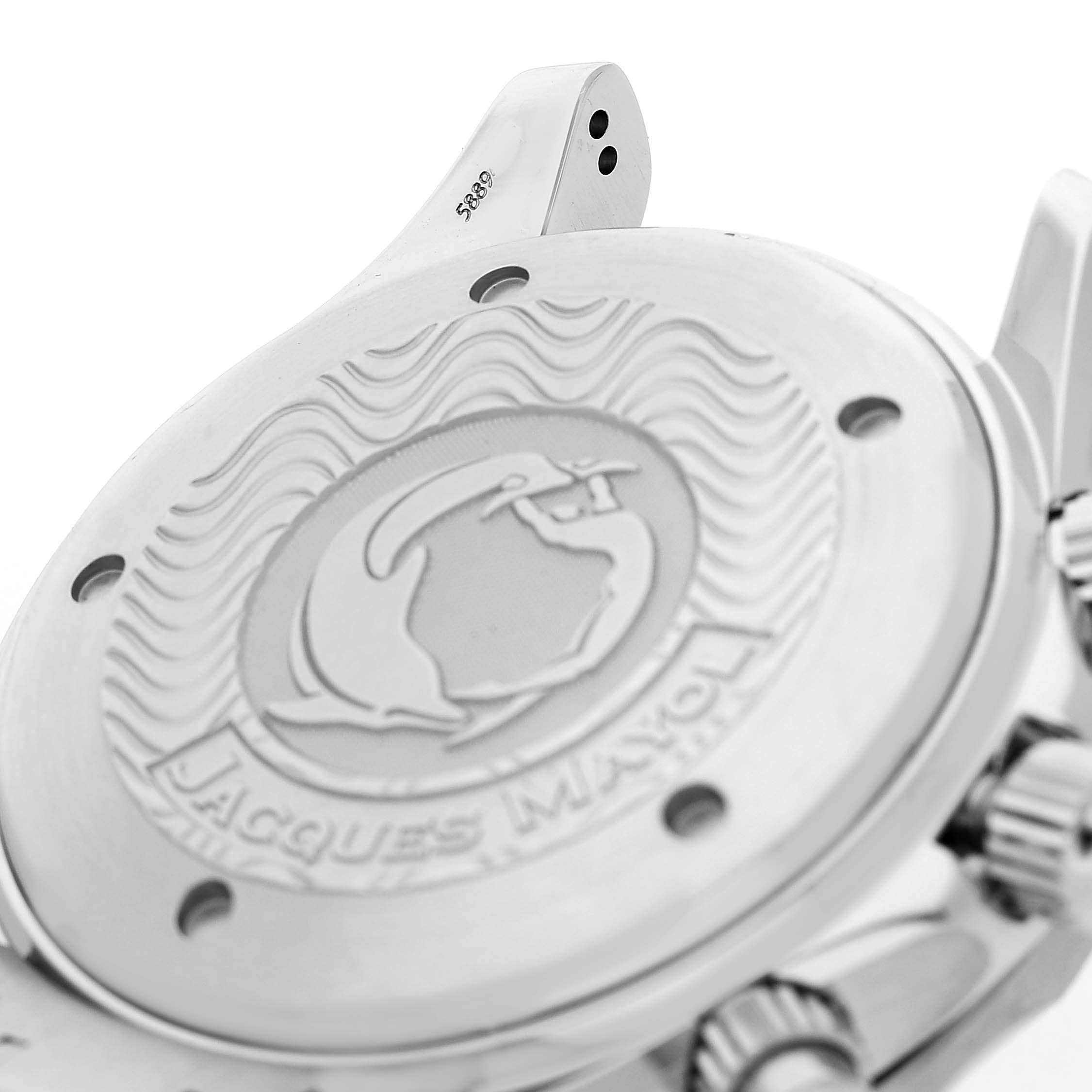 The image shows the case back and part of the crown of an Omega Seamaster 2595.30.00 Men's Stainless Steel Silver Dial watch, highlighting its engraving.