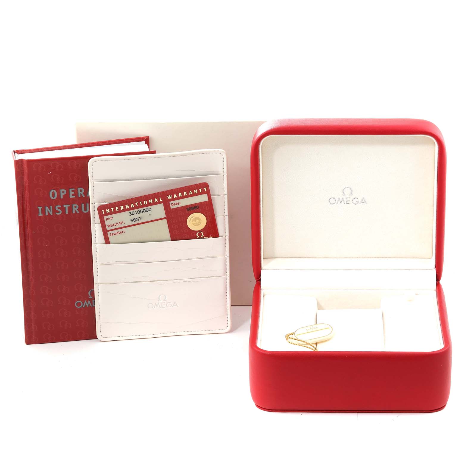 The image shows the Omega Speedmaster 3510.50.00 Men's Stainless Steel Black Dial 3510.50.00 Men's Stainless Steel Black Dial accessories, including a red box, warranty cardholder, and an instruction manual.