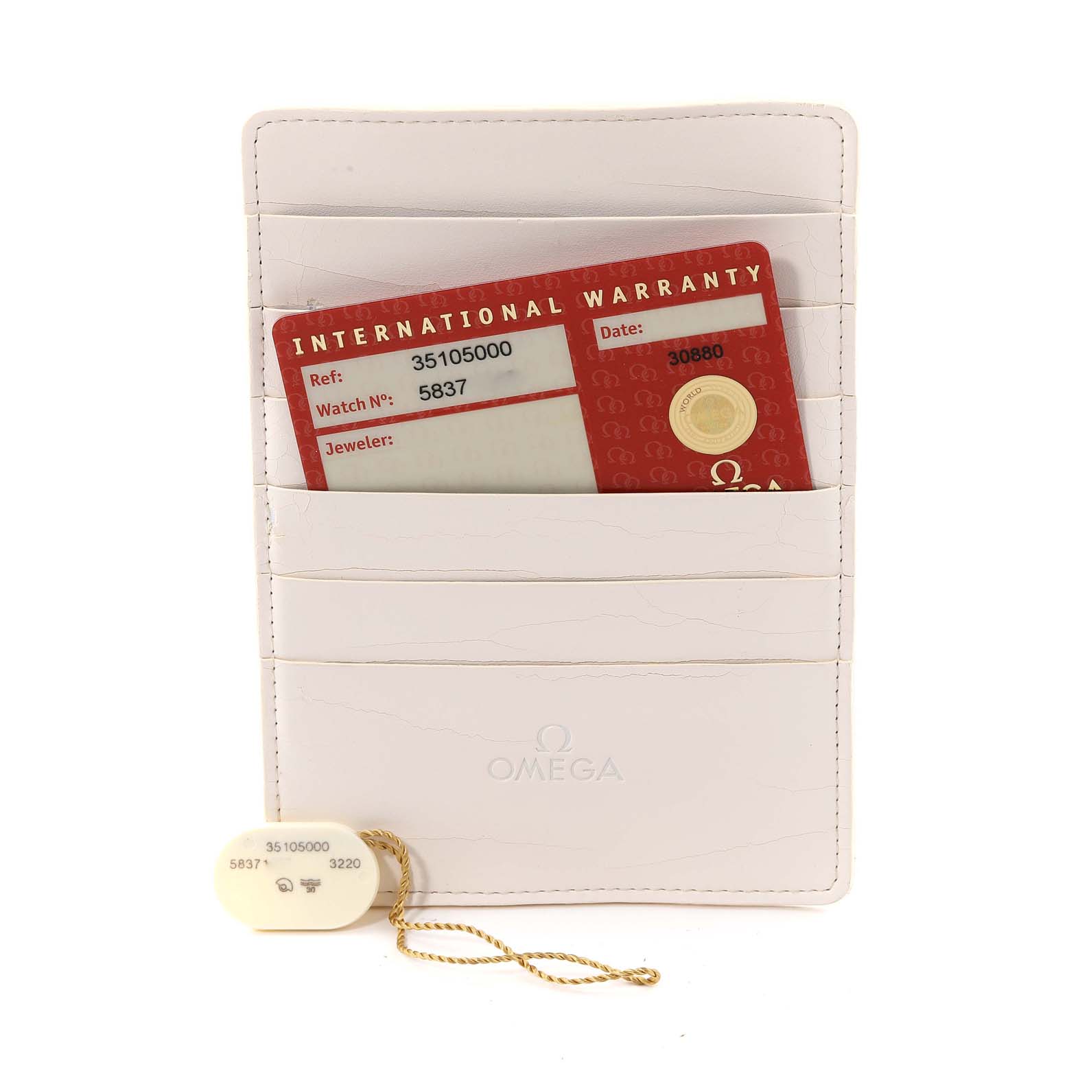 This image shows an Omega Speedmaster 3510.50.00 Men's Stainless Steel Black Dial 3510.50.00 Men's Stainless Steel Black Dial's international warranty card and tag in a white cardholder.